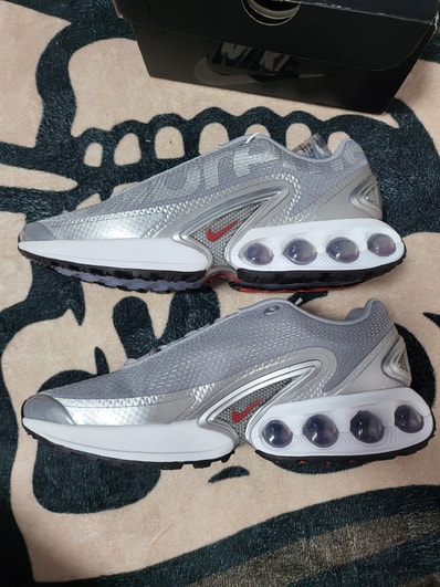 Supreme × Nike Air Max DN "Metallic Silver/University Red/White"