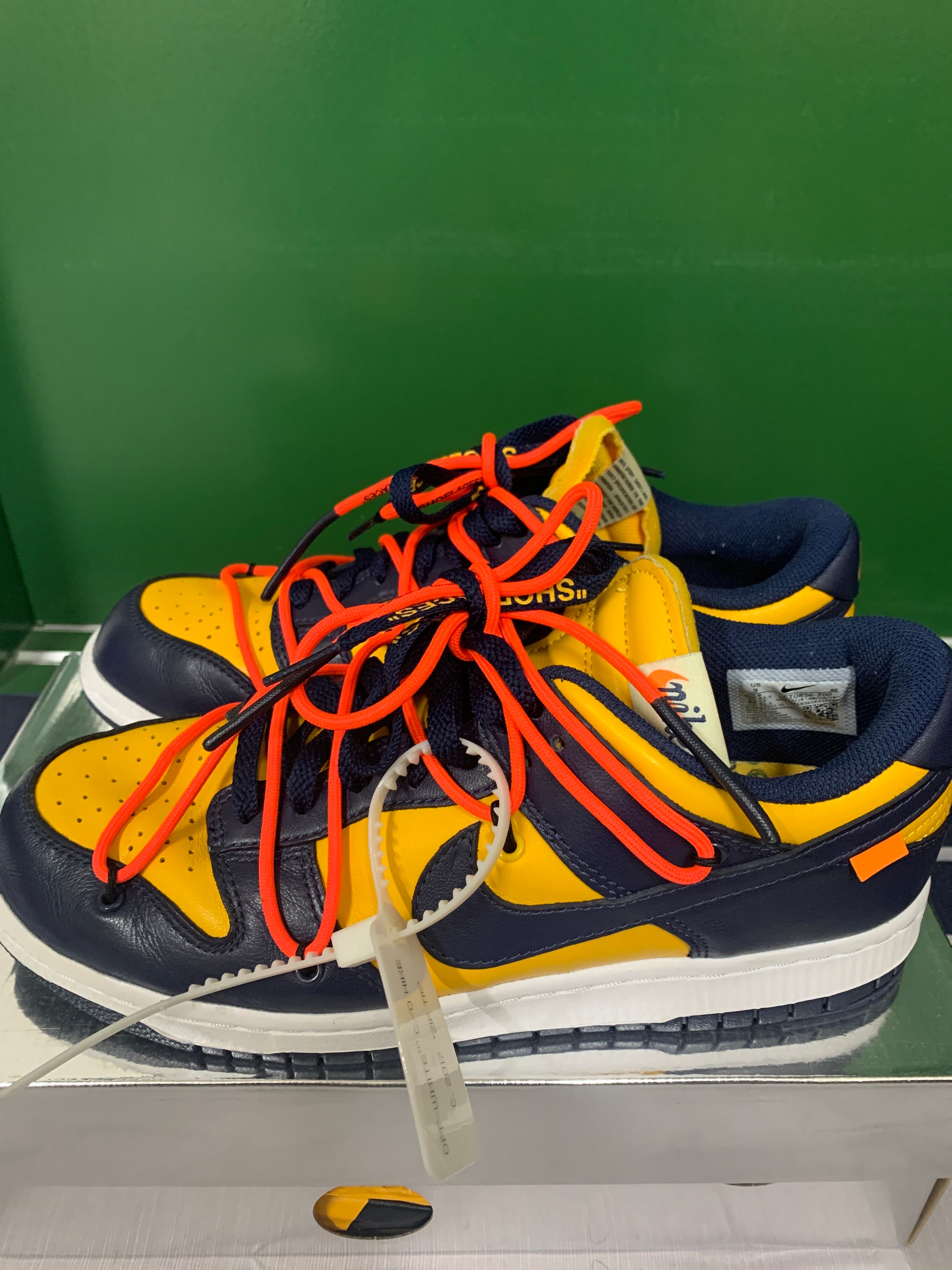 Off-White × Nike Dunk Low LTHR "University Gold/Midnight Navy/White"
