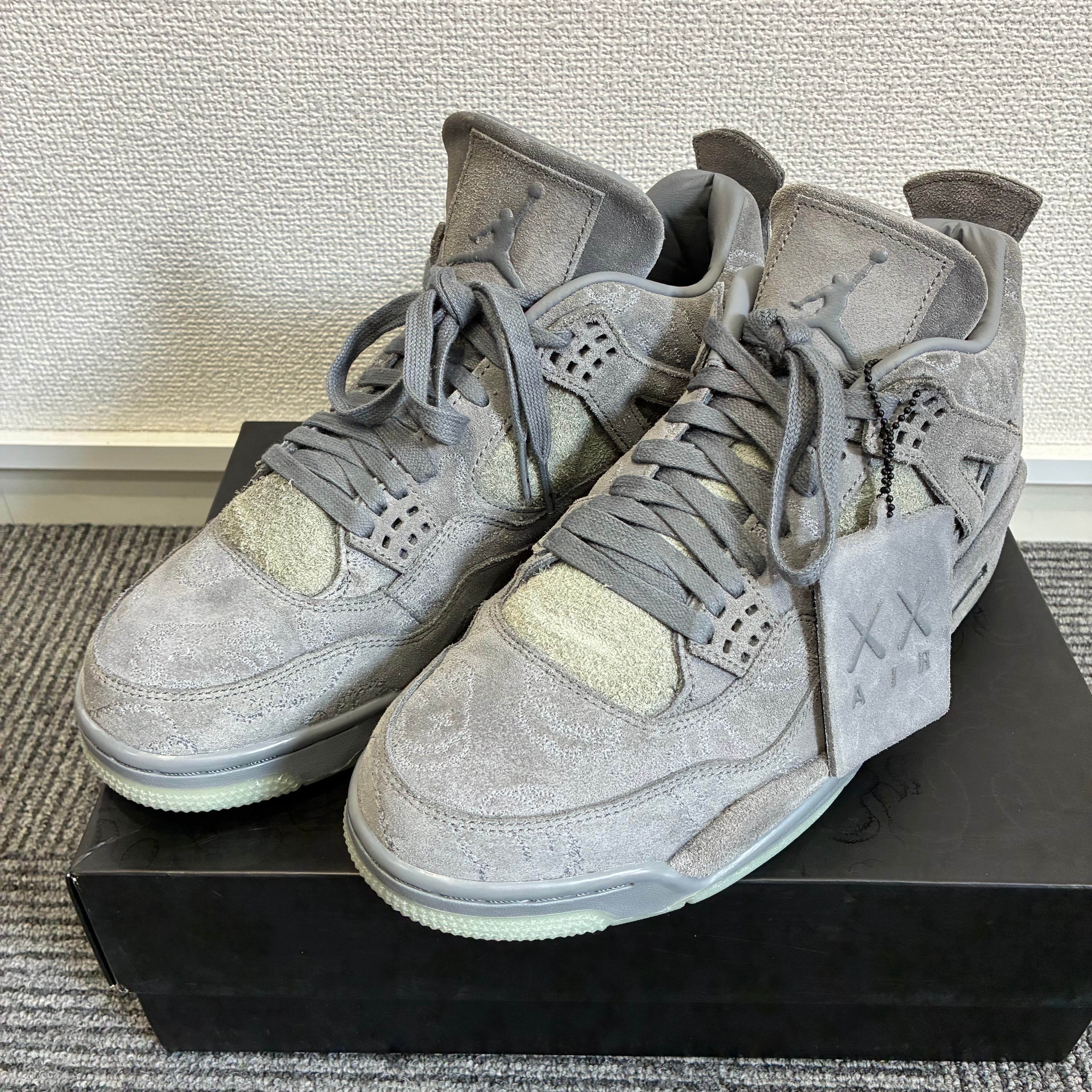 KAWS × Nike Air Jordan 4 Retro "Grey"