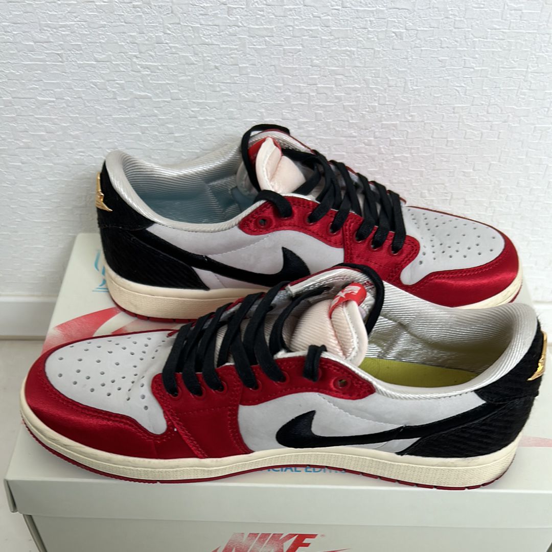 Trophy Room × Nike Air Jordan 1 Low OG "Sail and Varsity Red"