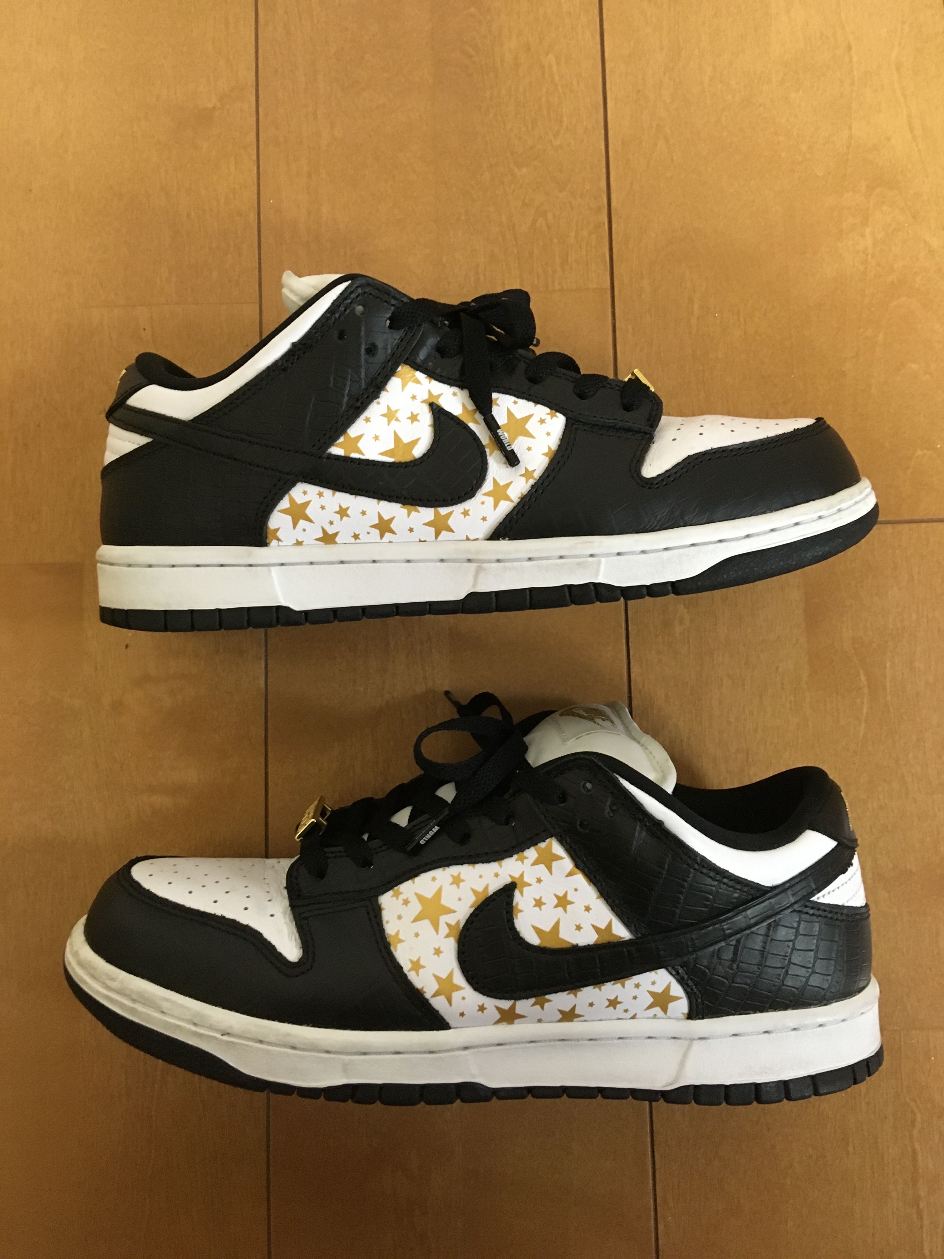 Supreme × Nike SB Dunk Low OG QS Gold Stars "White/Black"