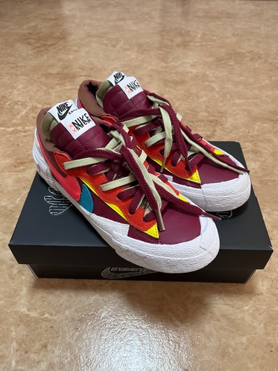 KAWS × sacai × Nike Blazer Low "Team Red"