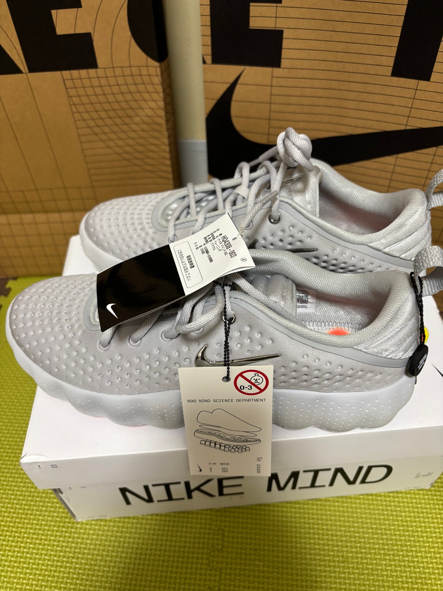 Nike Mind 002 "Light Smoke Grey/Photon Dust/Hyper Crimson"