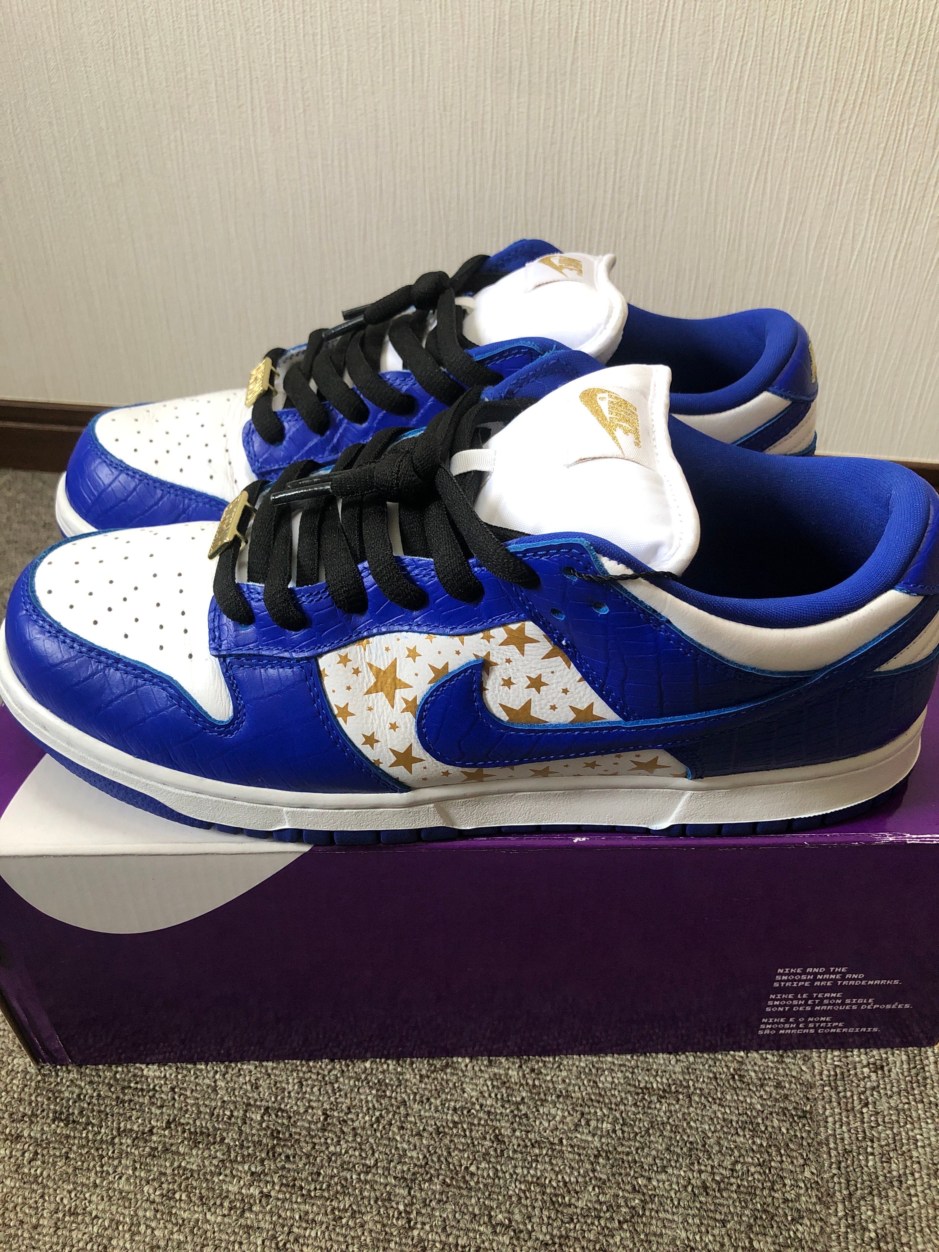 Supreme × Nike SB Dunk Low OG QS Gold Stars "White/Hyper Blue"
