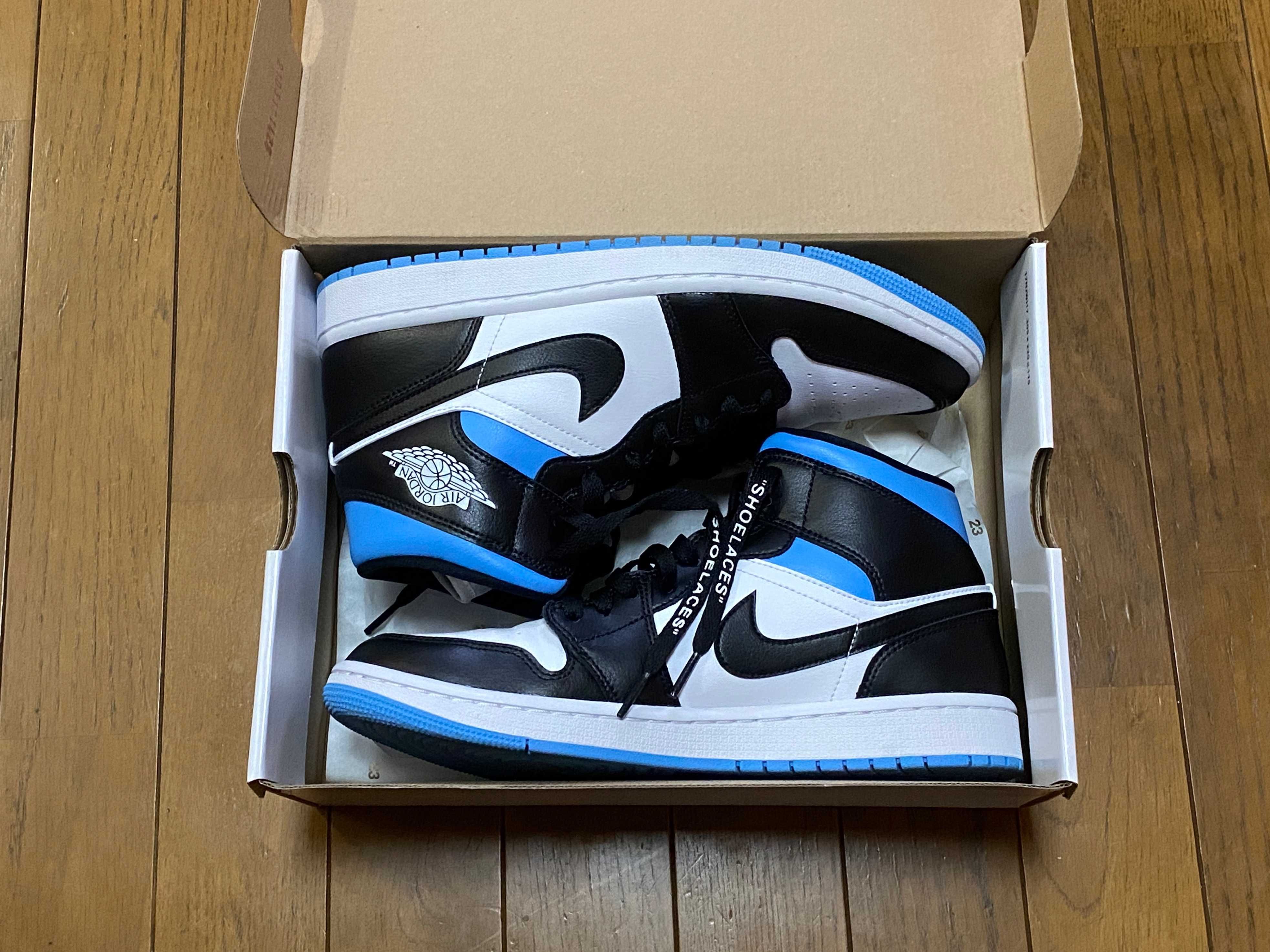 Nike Women's Air Jordan 1 Mid "Black/University Blue"