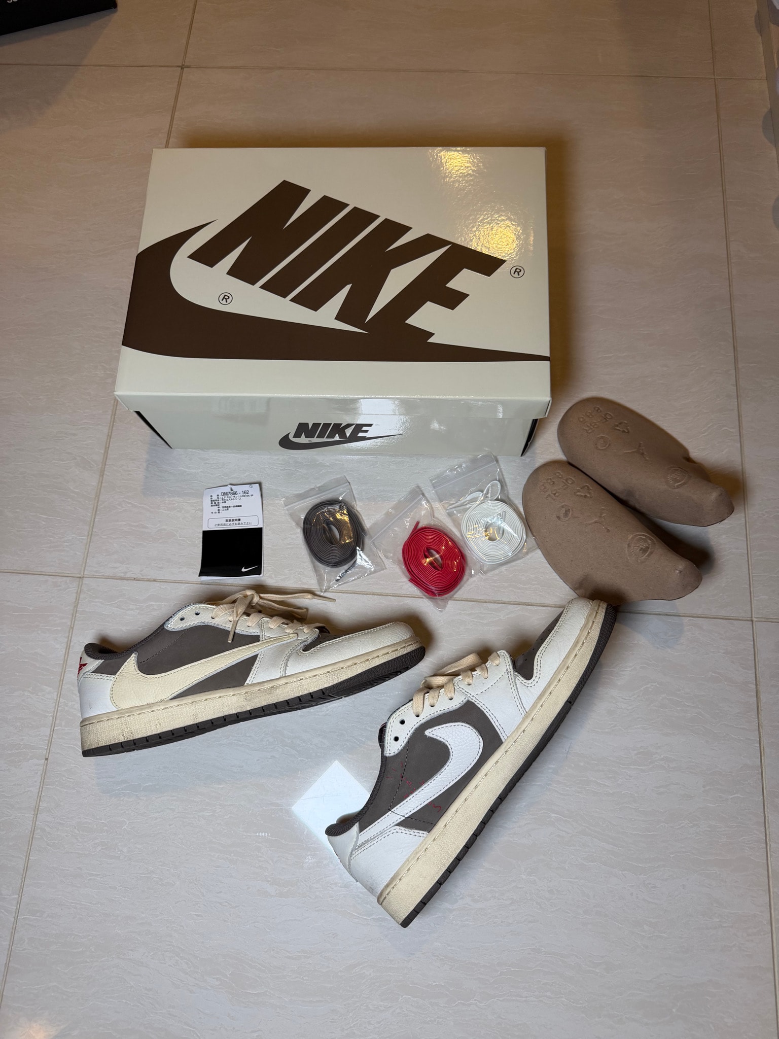 Travis Scott × Nike Air Jordan 1 Low OG SP "Reverse Mocha/Sail and Ridgerock"