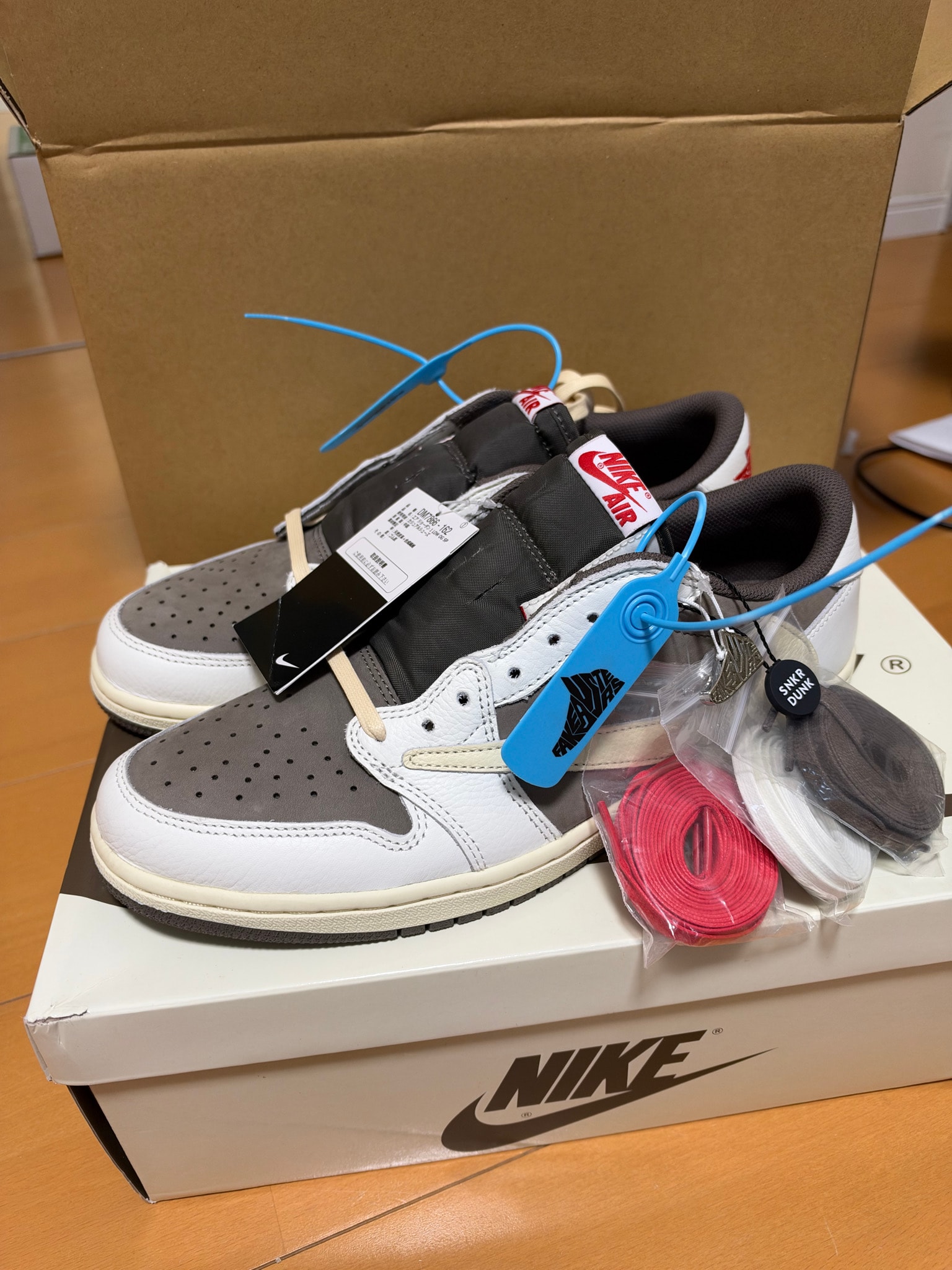 Travis Scott × Nike Air Jordan 1 Low OG SP "Reverse Mocha/Sail and Ridgerock"