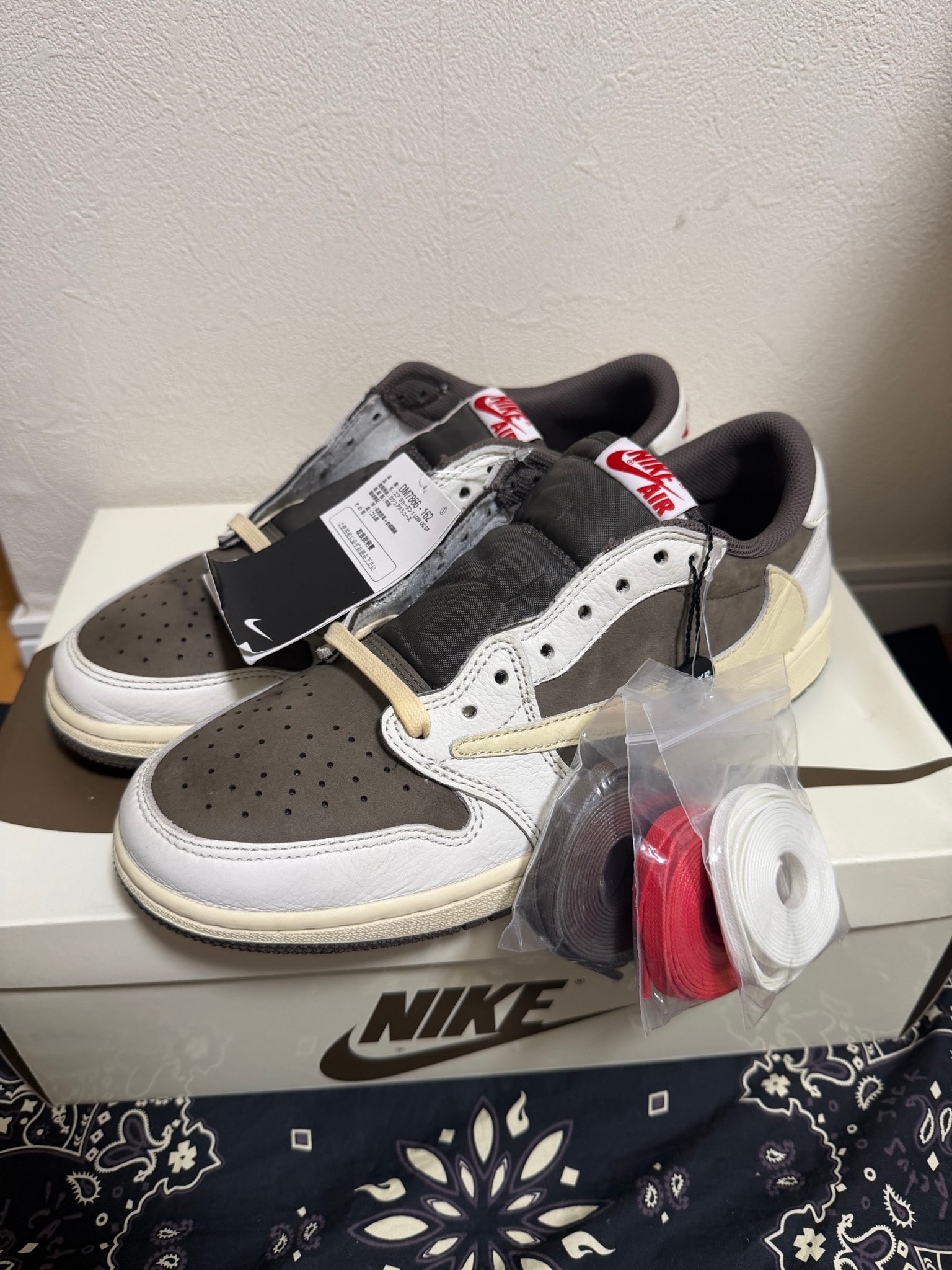 Travis Scott × Nike Air Jordan 1 Low OG SP "Reverse Mocha/Sail and Ridgerock"