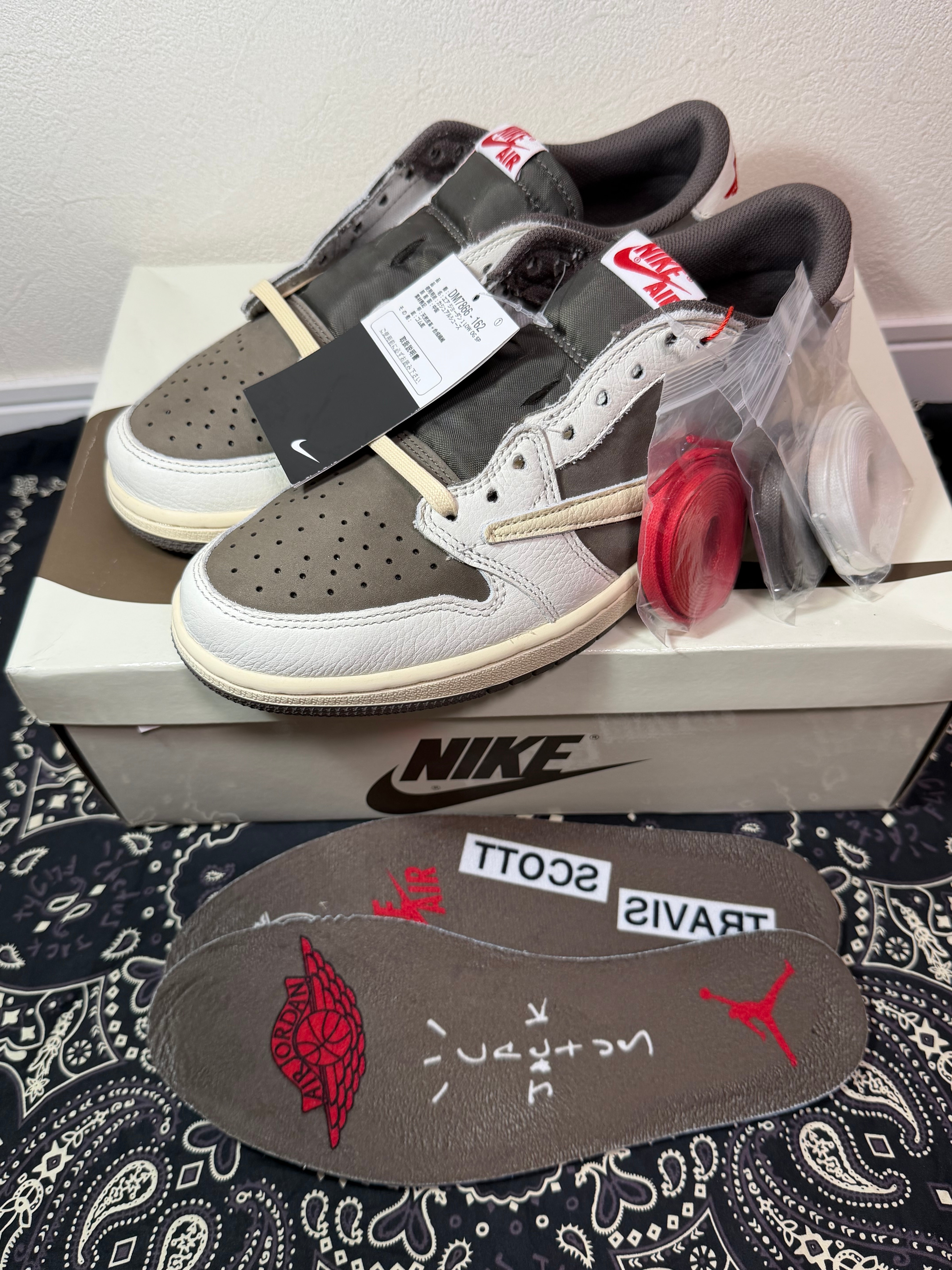 Travis Scott × Nike Air Jordan 1 Low OG SP "Reverse Mocha/Sail and Ridgerock"