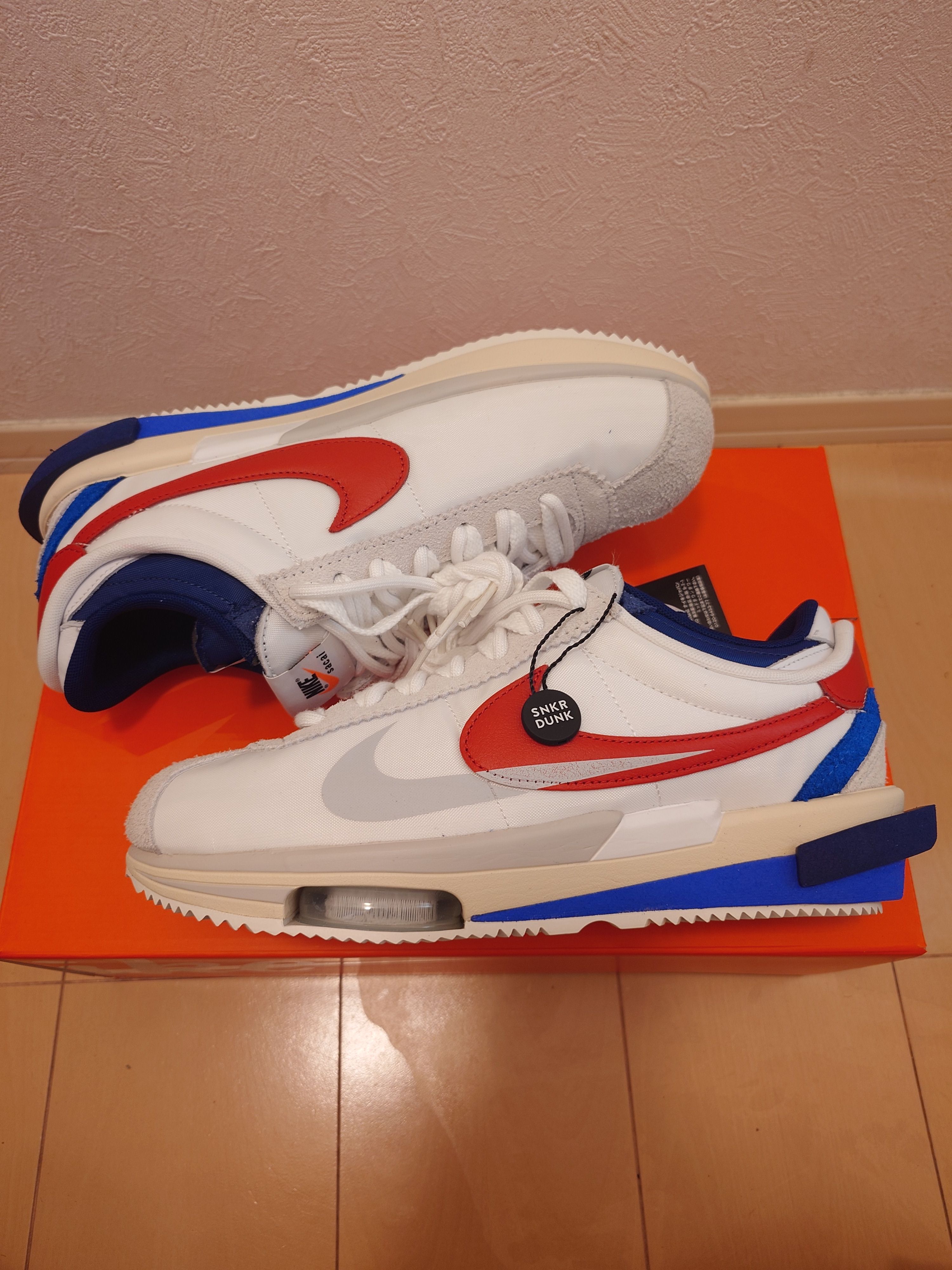 sacai × Nike Zoom Cortez "White and University Red"