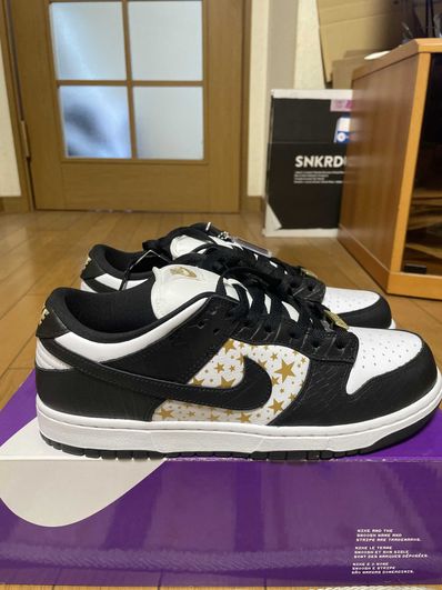Supreme × Nike SB Dunk Low OG QS Gold Stars "White/Black"