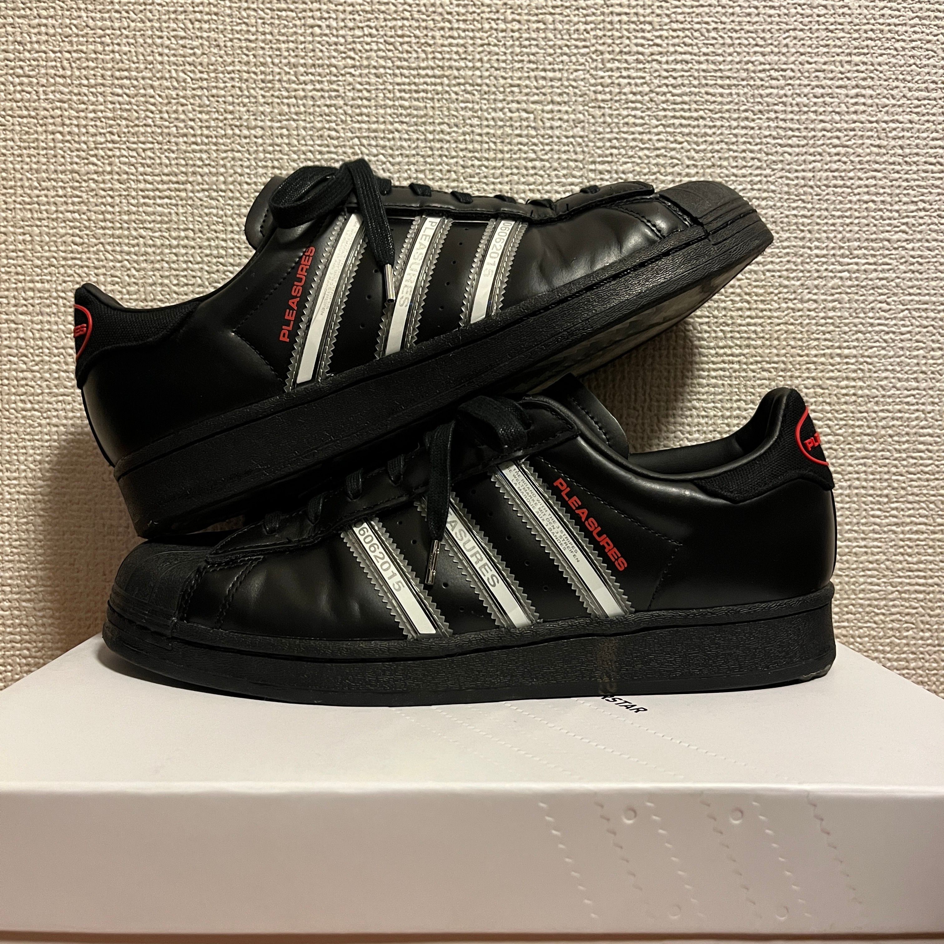 PLEASURES × adidas CONSORTIUM SUPERSTAR "BLACK"