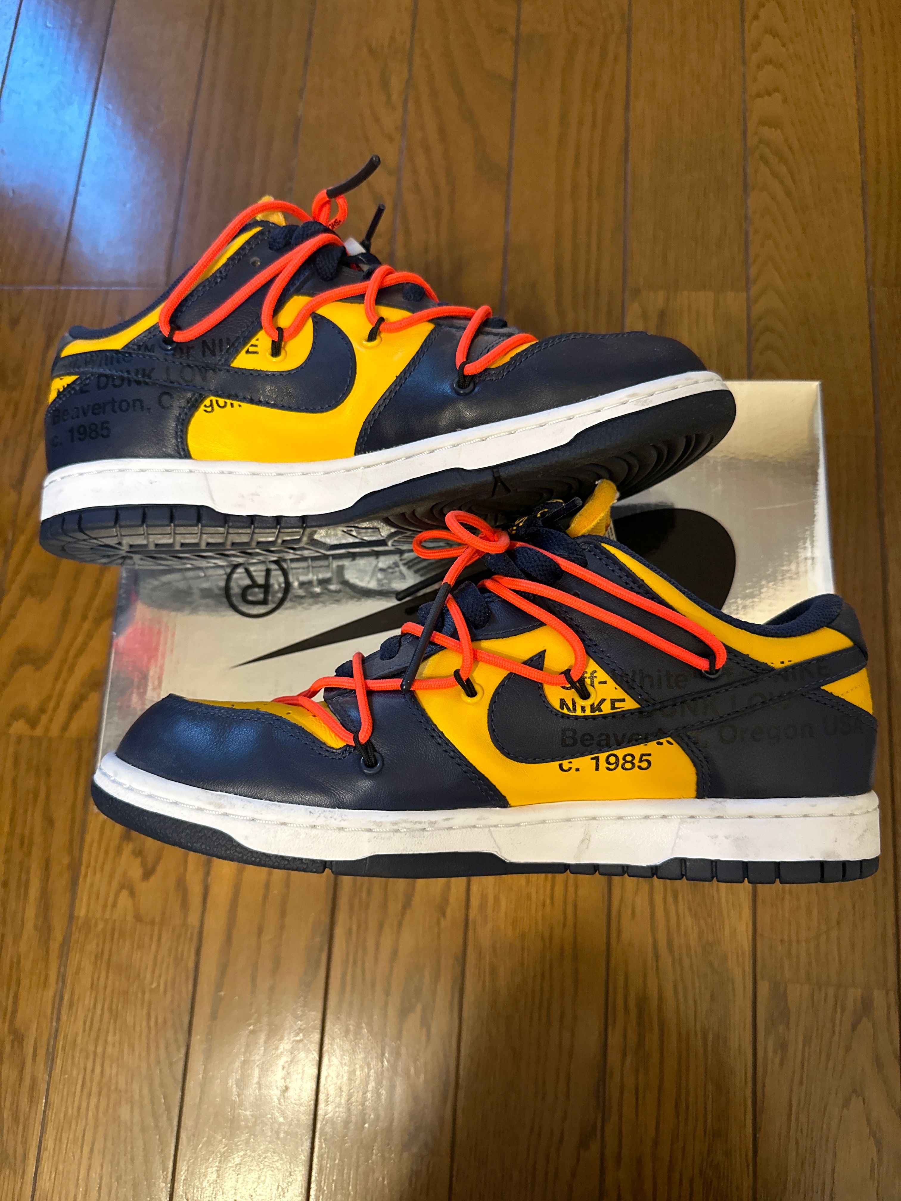 Off-White × Nike Dunk Low LTHR "University Gold/Midnight Navy/White"