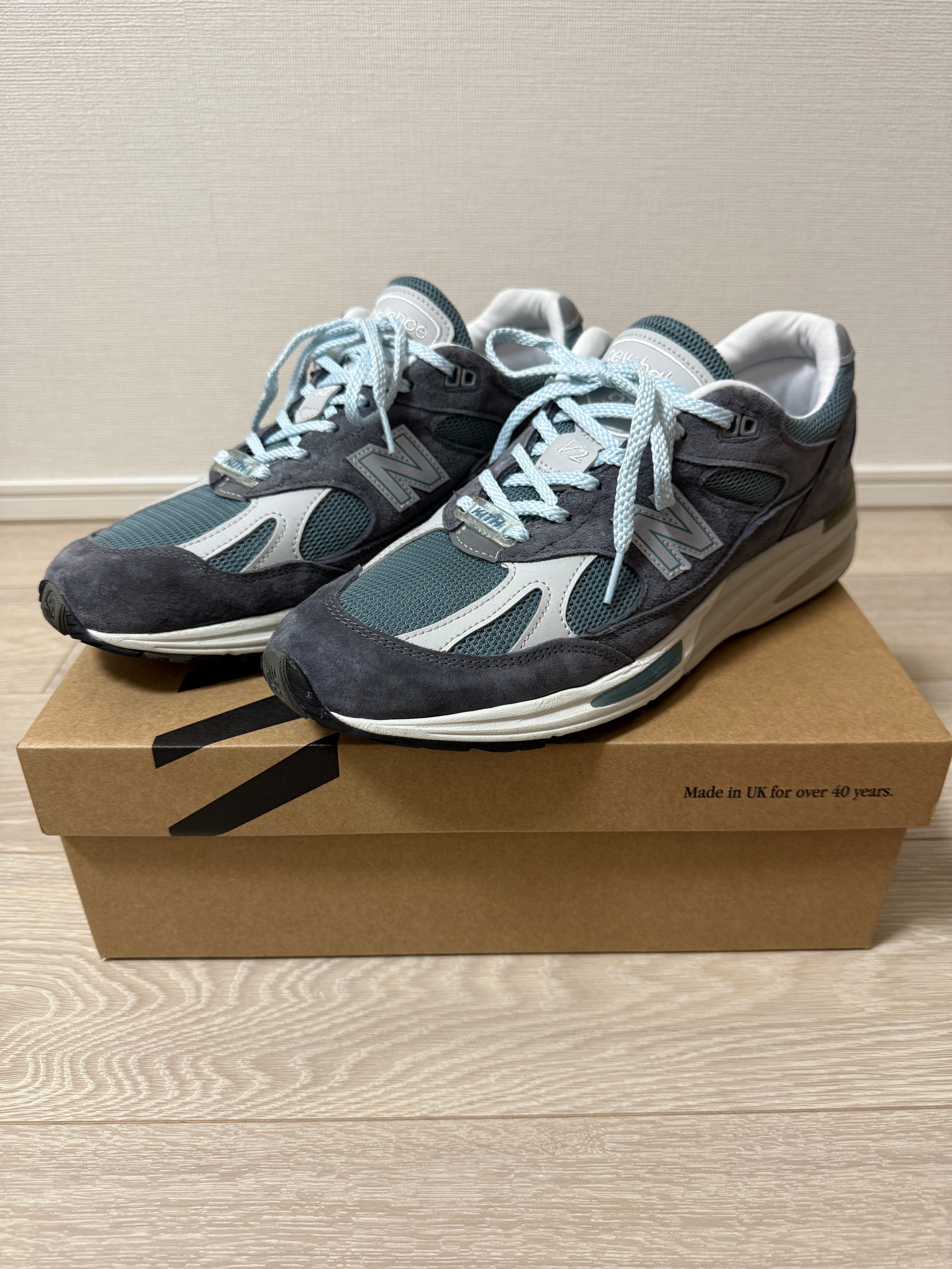 KITH × New Balance 991V2 "Asphalt/Lead/Oyster Mushroom"