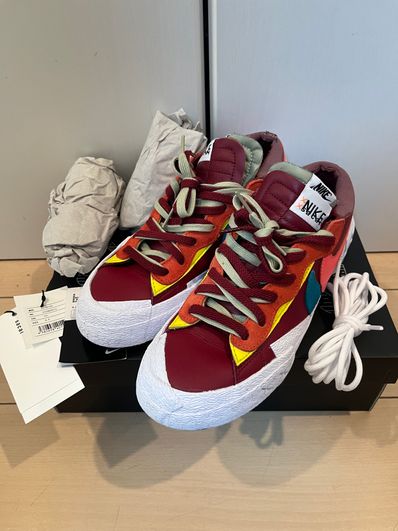 KAWS × sacai × Nike Blazer Low "Team Red"