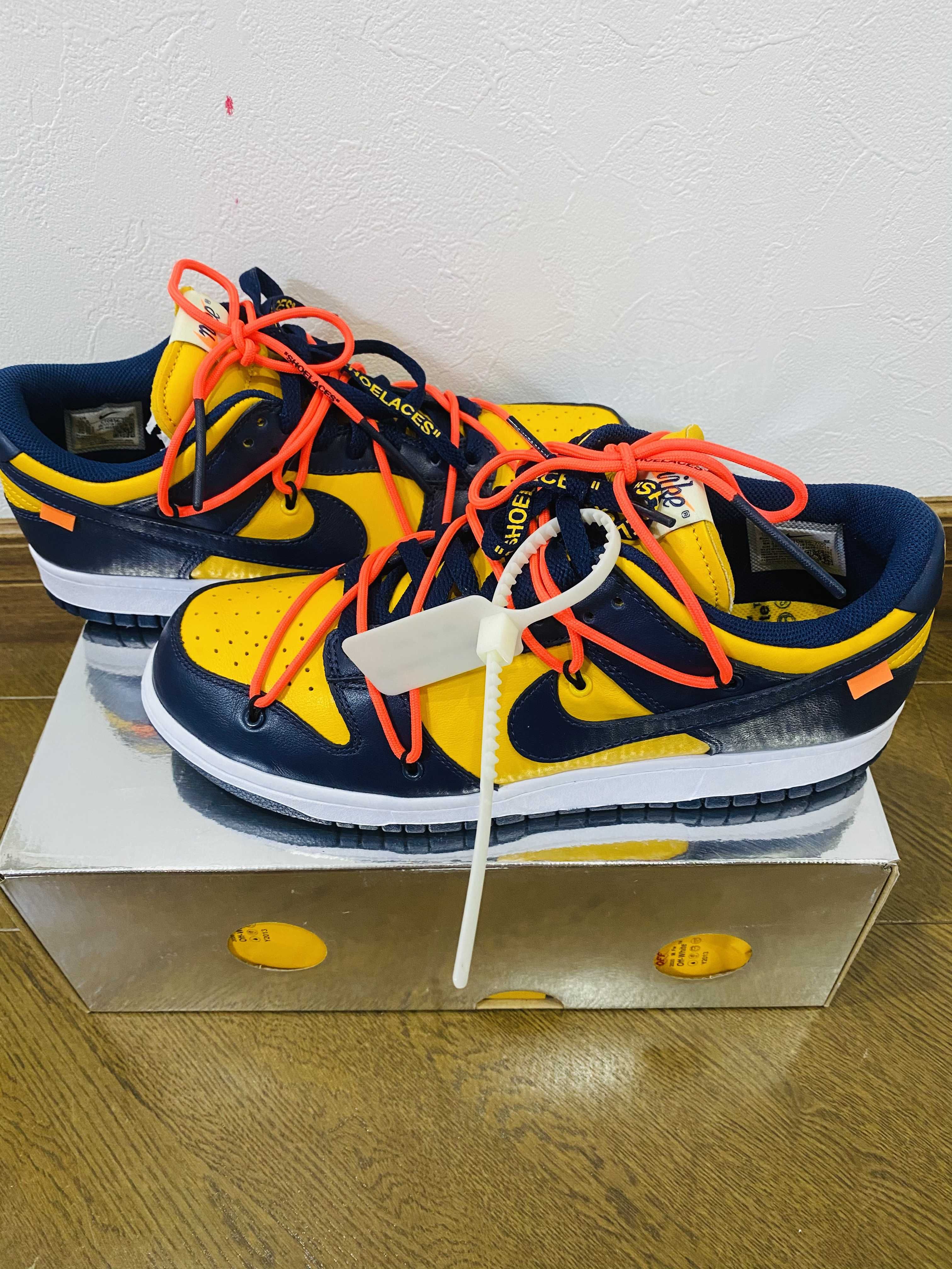 Off-White × Nike Dunk Low LTHR "University Gold/Midnight Navy/White"