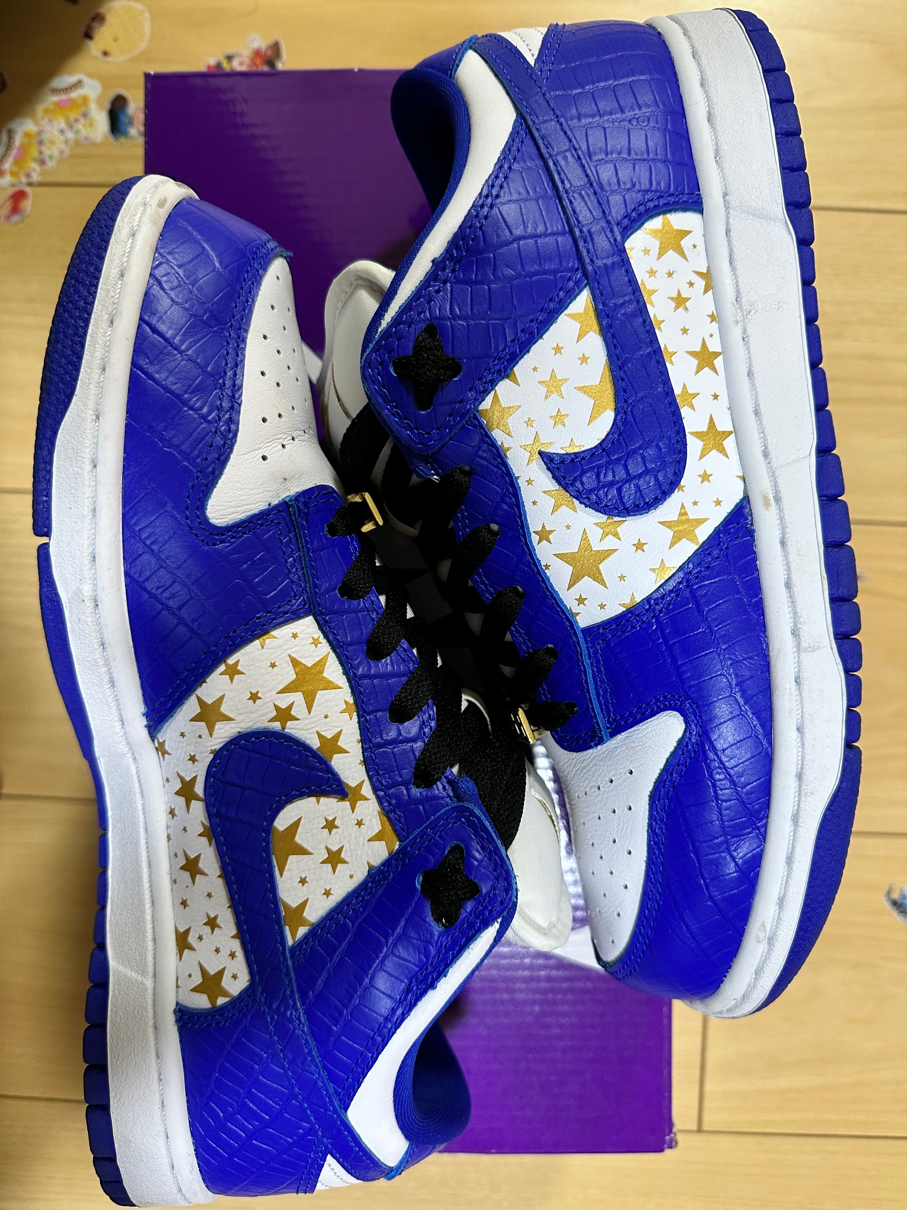 Supreme × Nike SB Dunk Low OG QS Gold Stars "White/Hyper Blue"