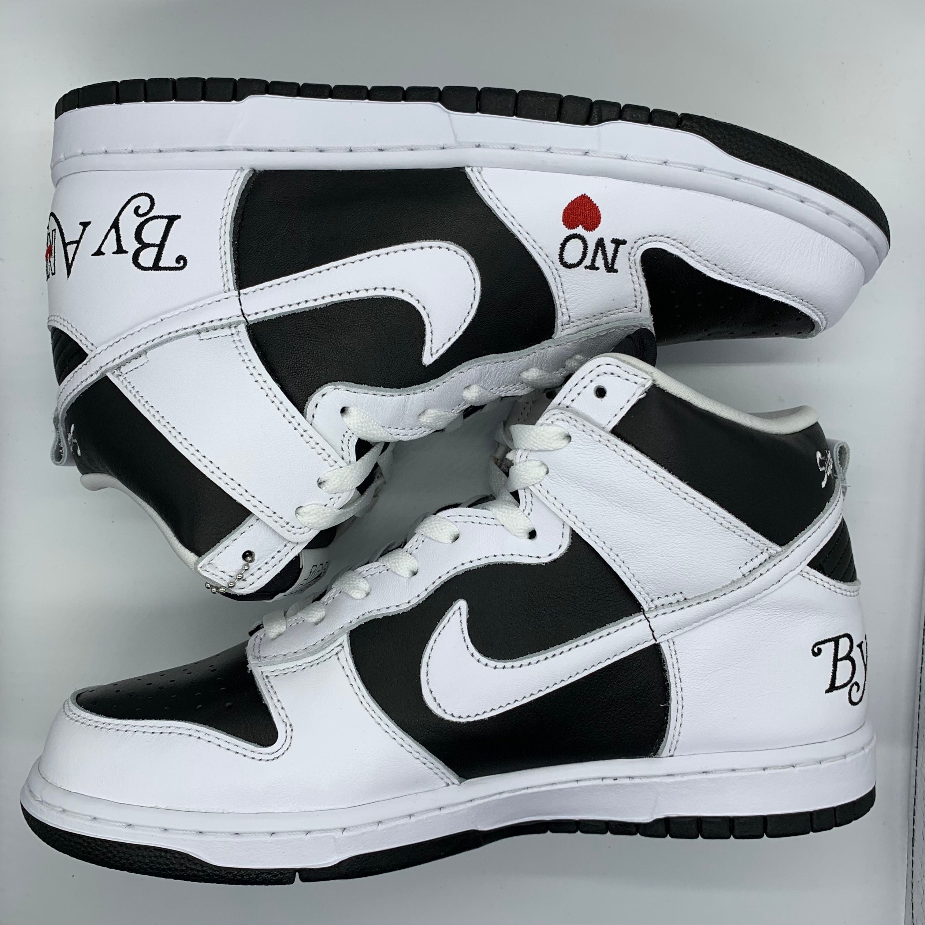 Supreme × Nike SB Dunk High By Any Means "White Black"