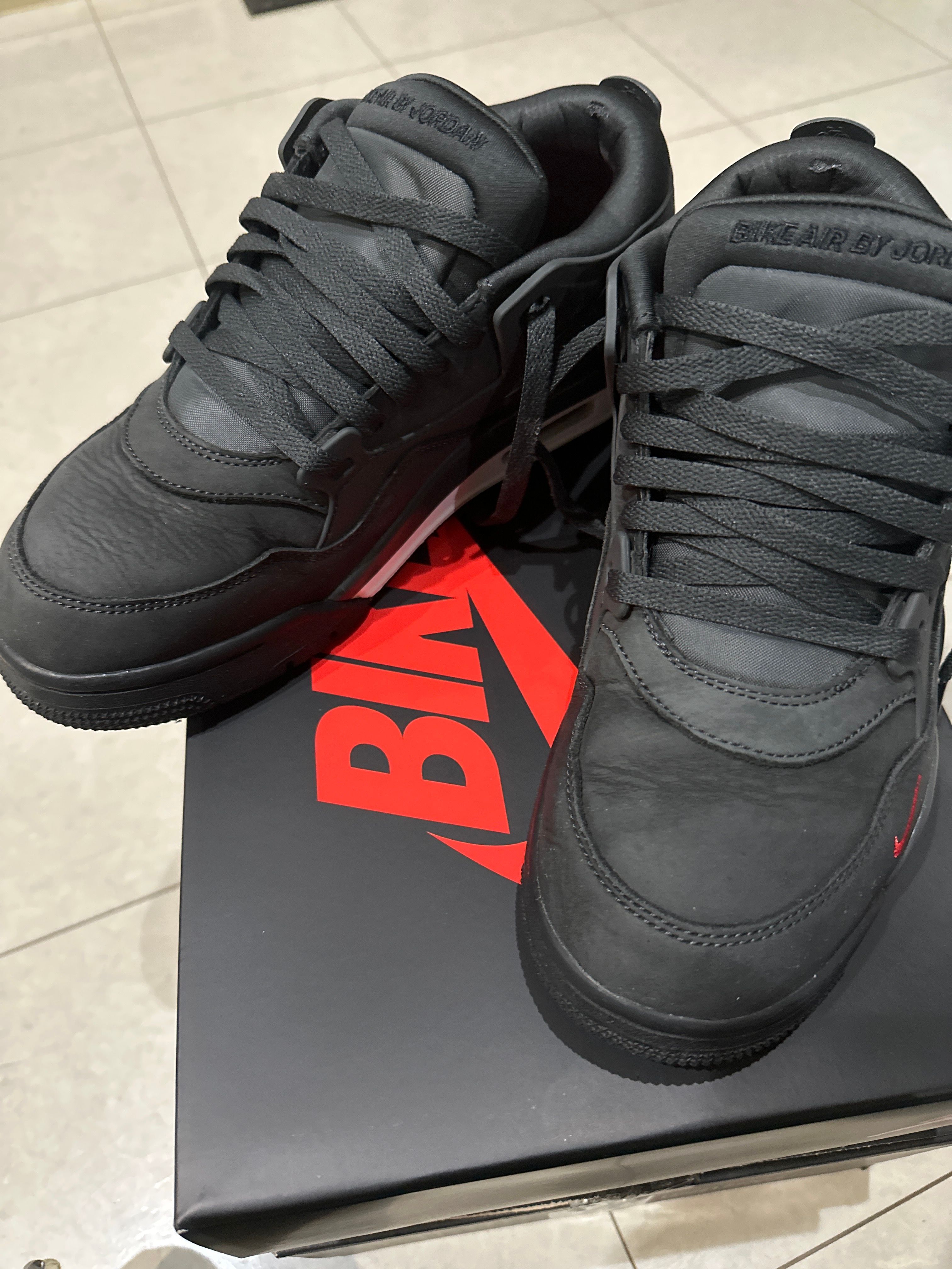 Nigel Sylvester × Nike Air Jordan 4 RM SP "Driveway Grey"