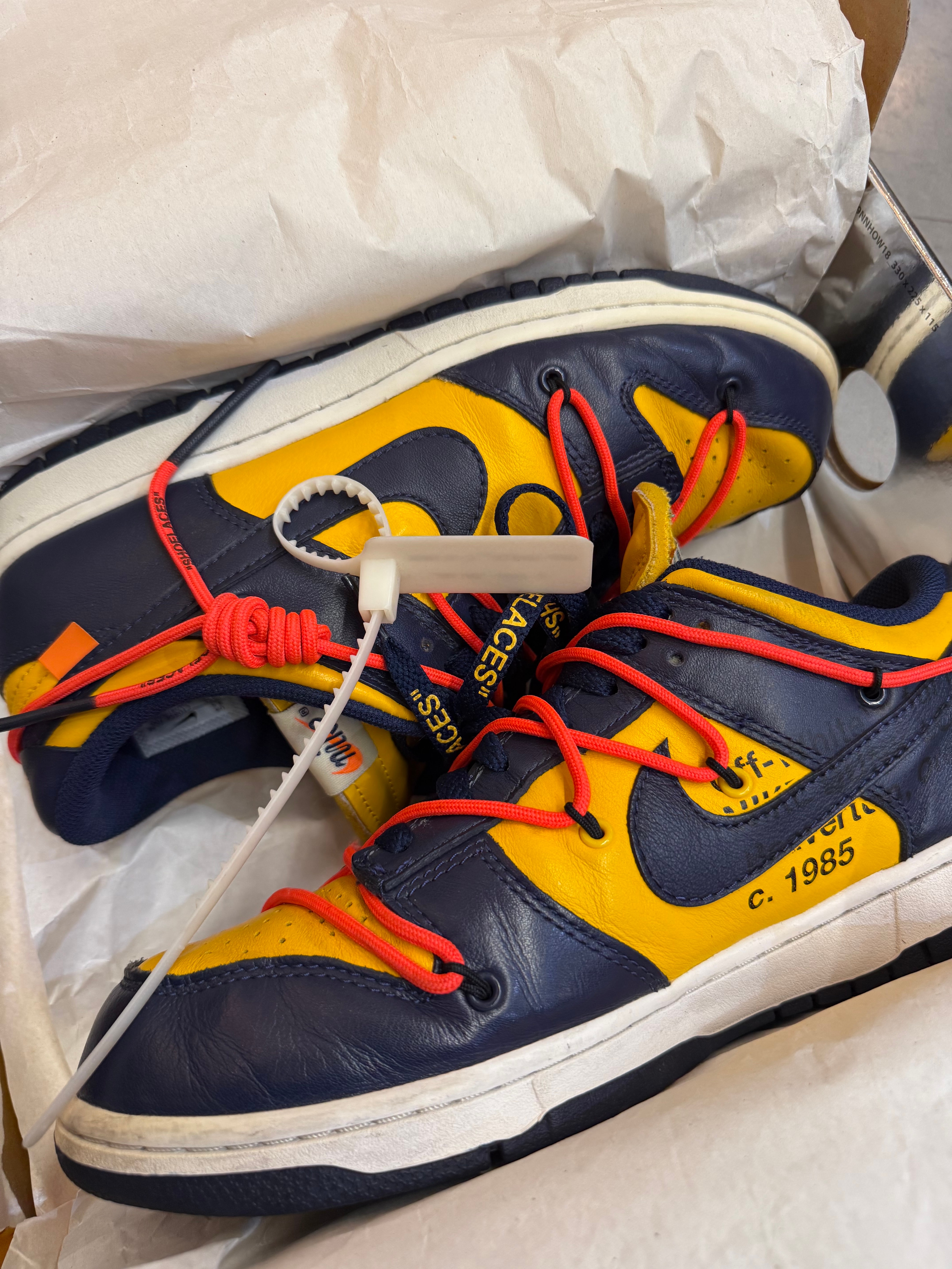 Off-White × Nike Dunk Low LTHR "University Gold/Midnight Navy/White"