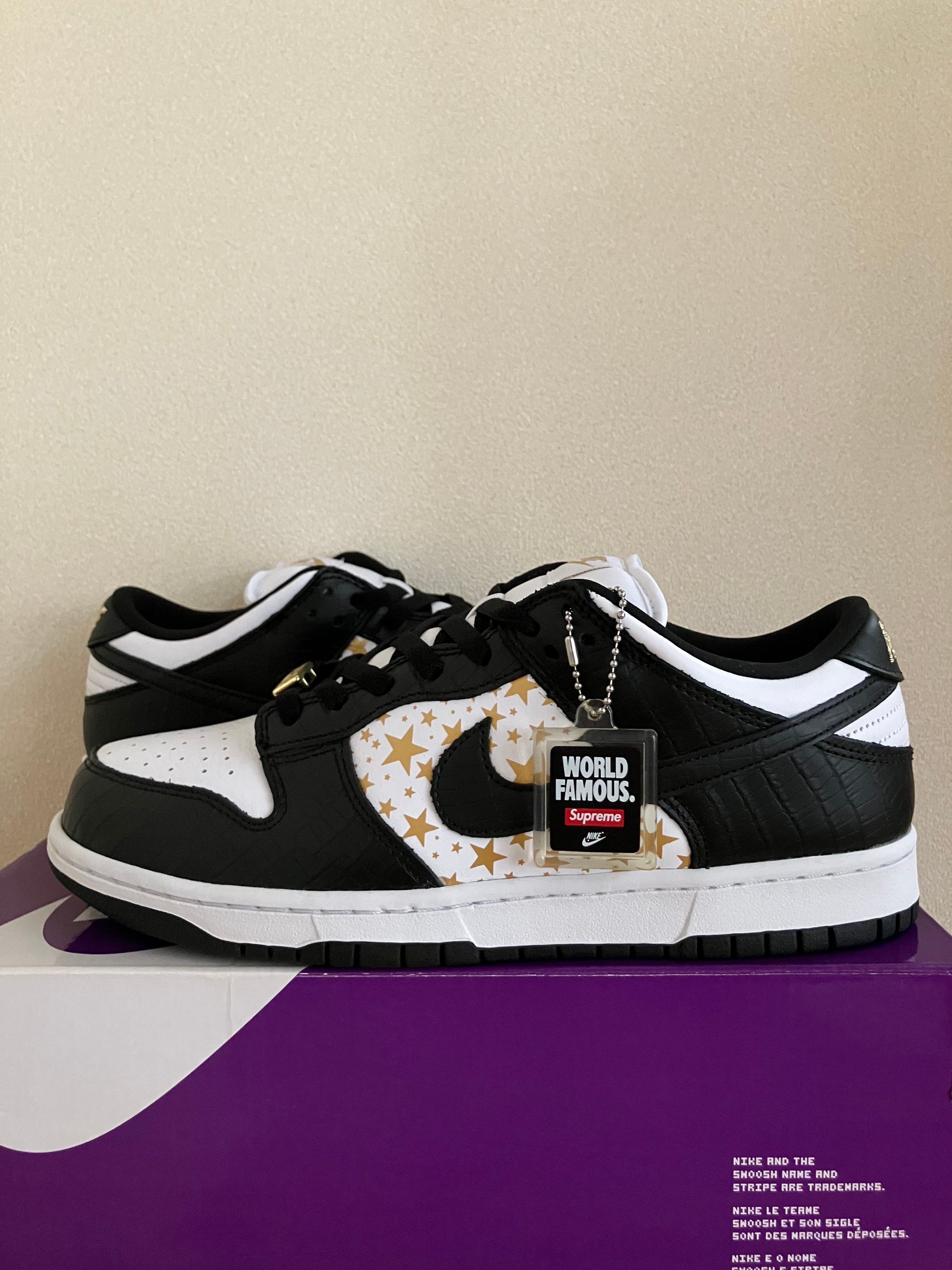 Supreme × Nike SB Dunk Low OG QS Gold Stars "White/Black"