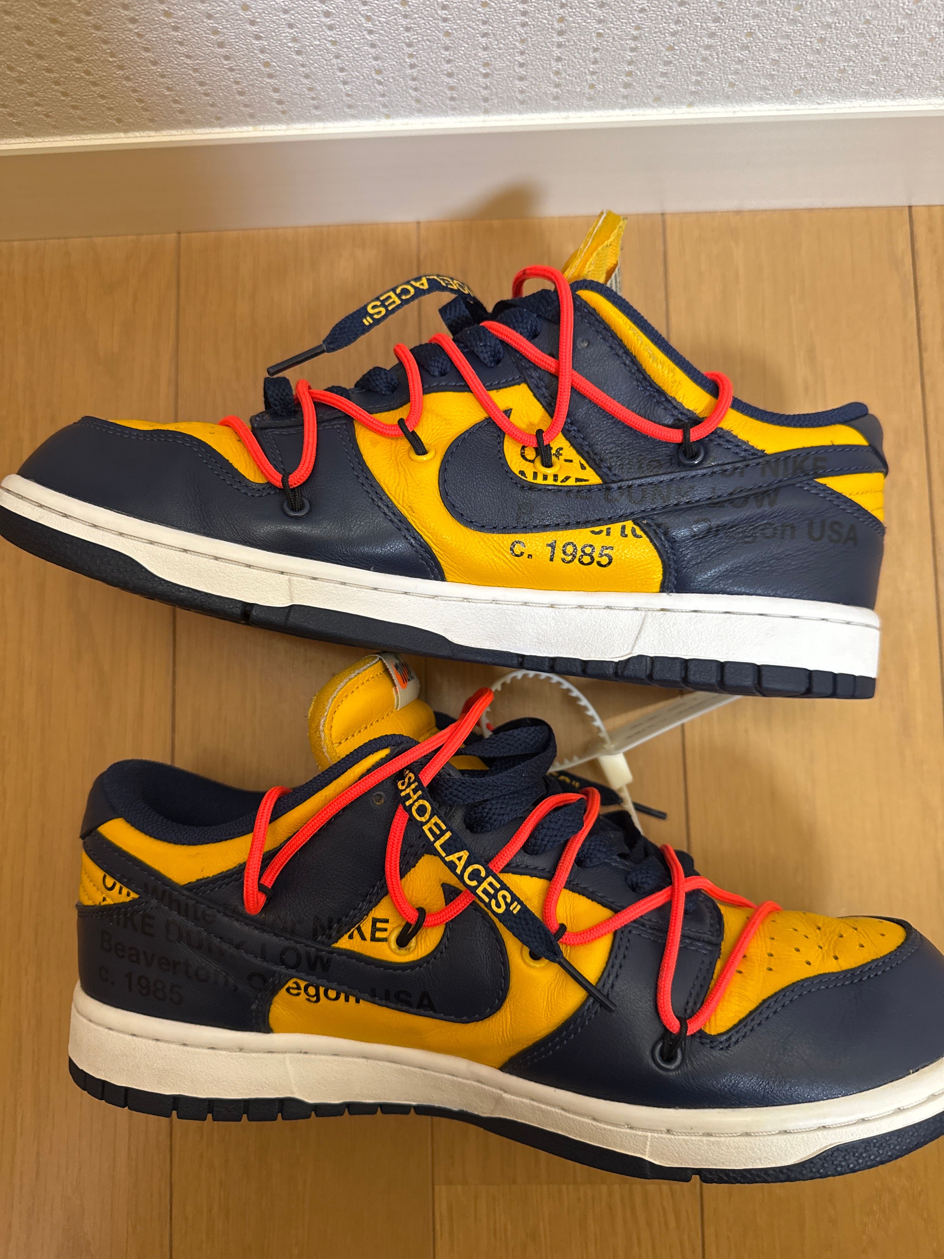 Off-White × Nike Dunk Low LTHR "University Gold/Midnight Navy/White"