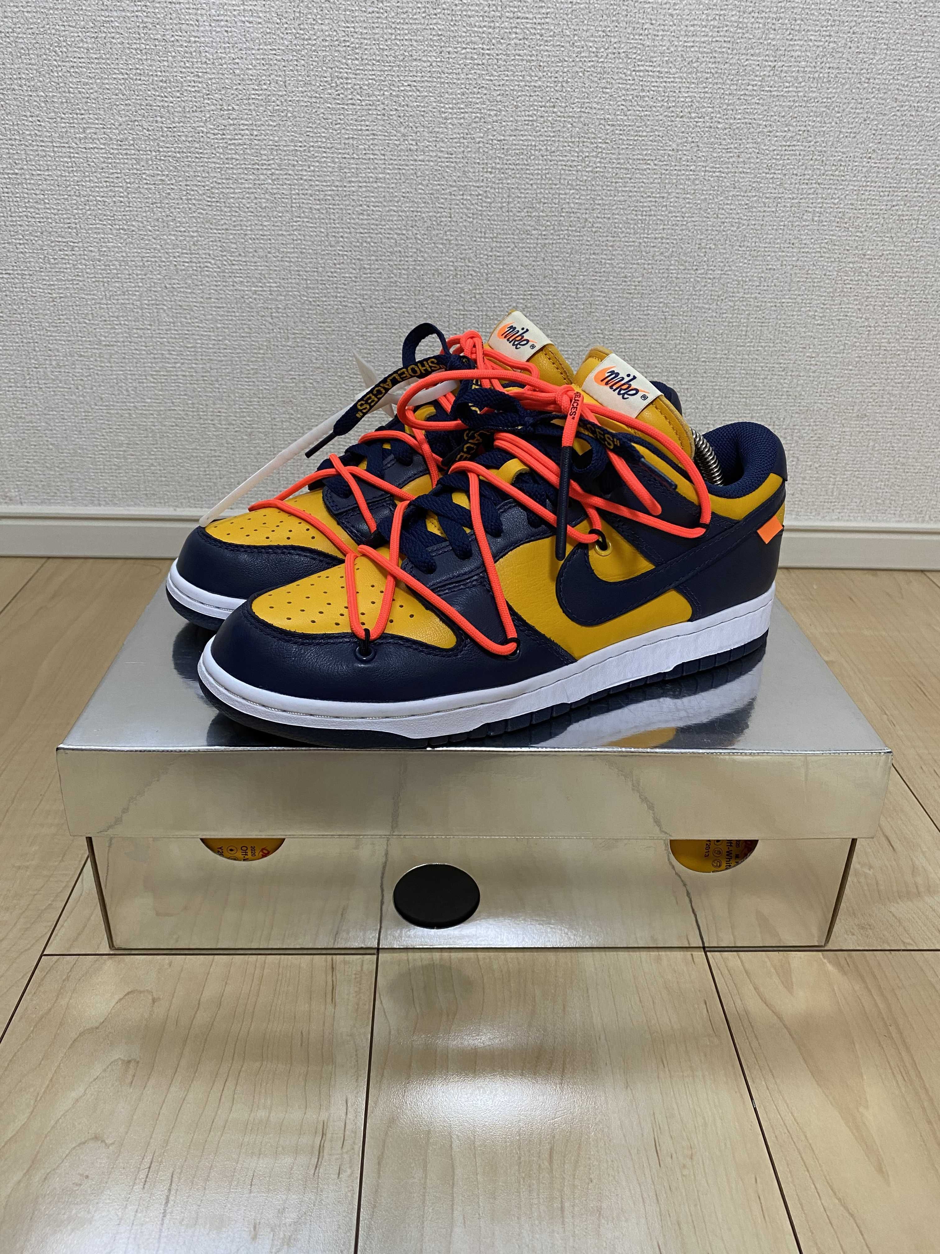 Off-White × Nike Dunk Low LTHR "University Gold/Midnight Navy/White"