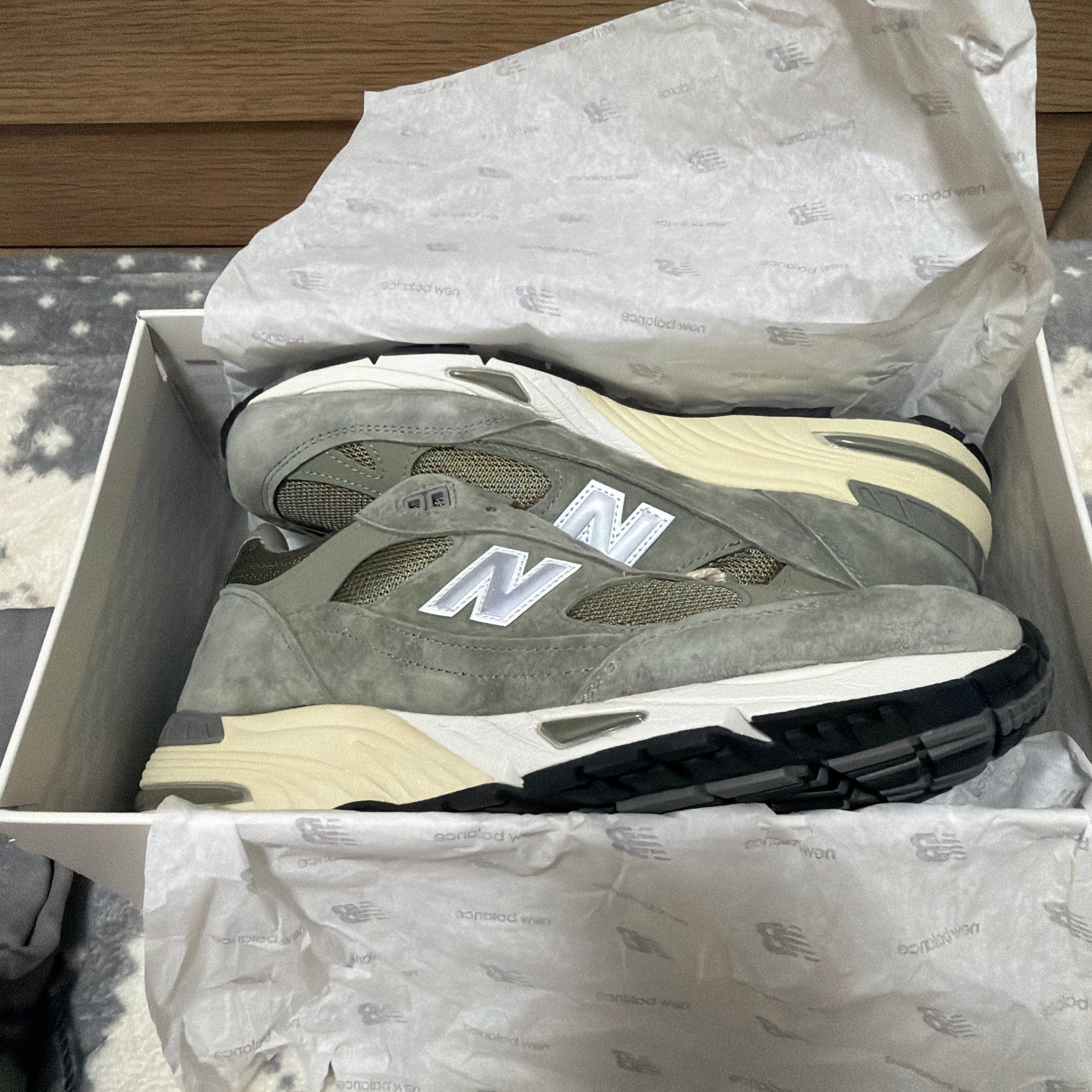 KITH 101 × New Balance 991 "Vetiver"