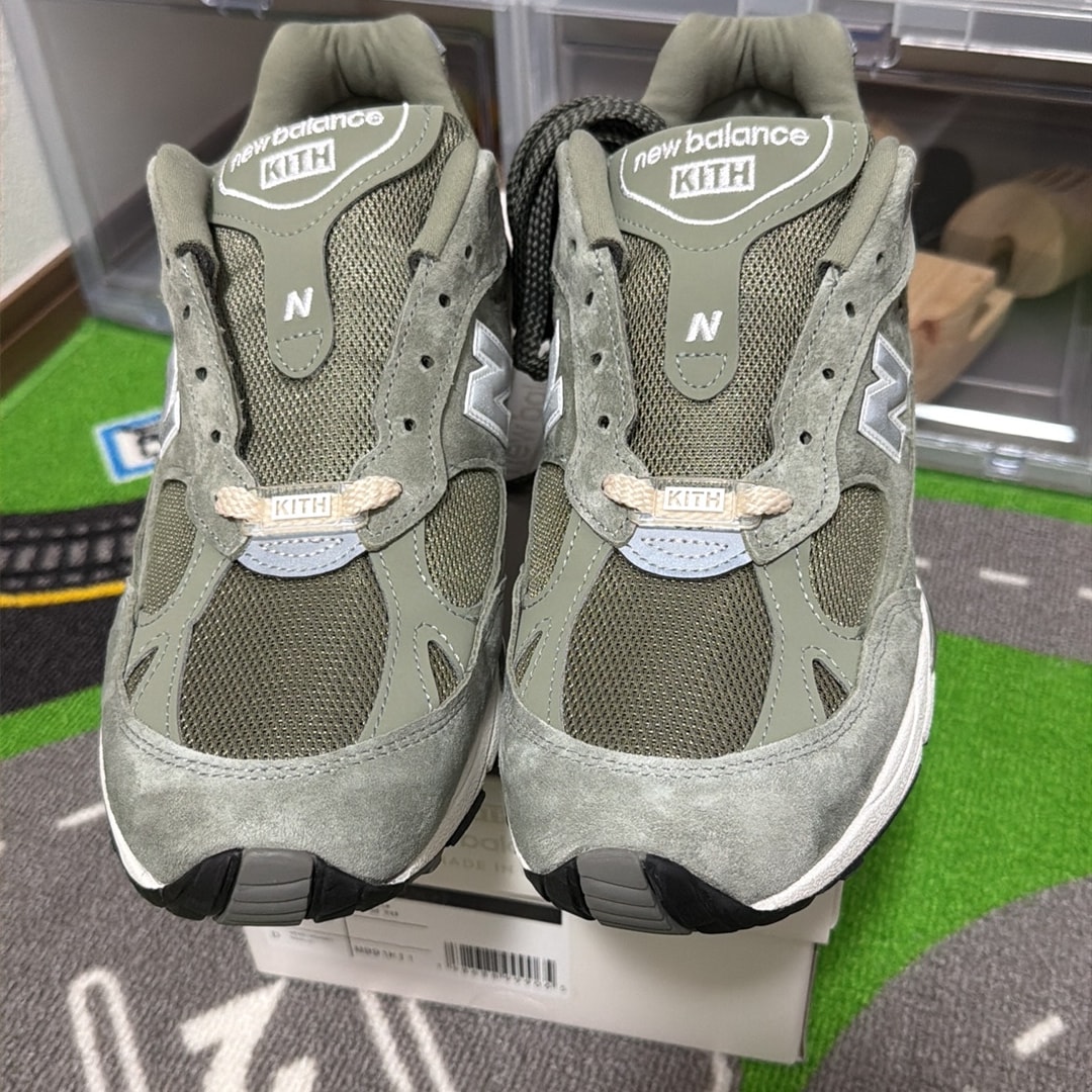 KITH 101 × New Balance 991 "Vetiver"
