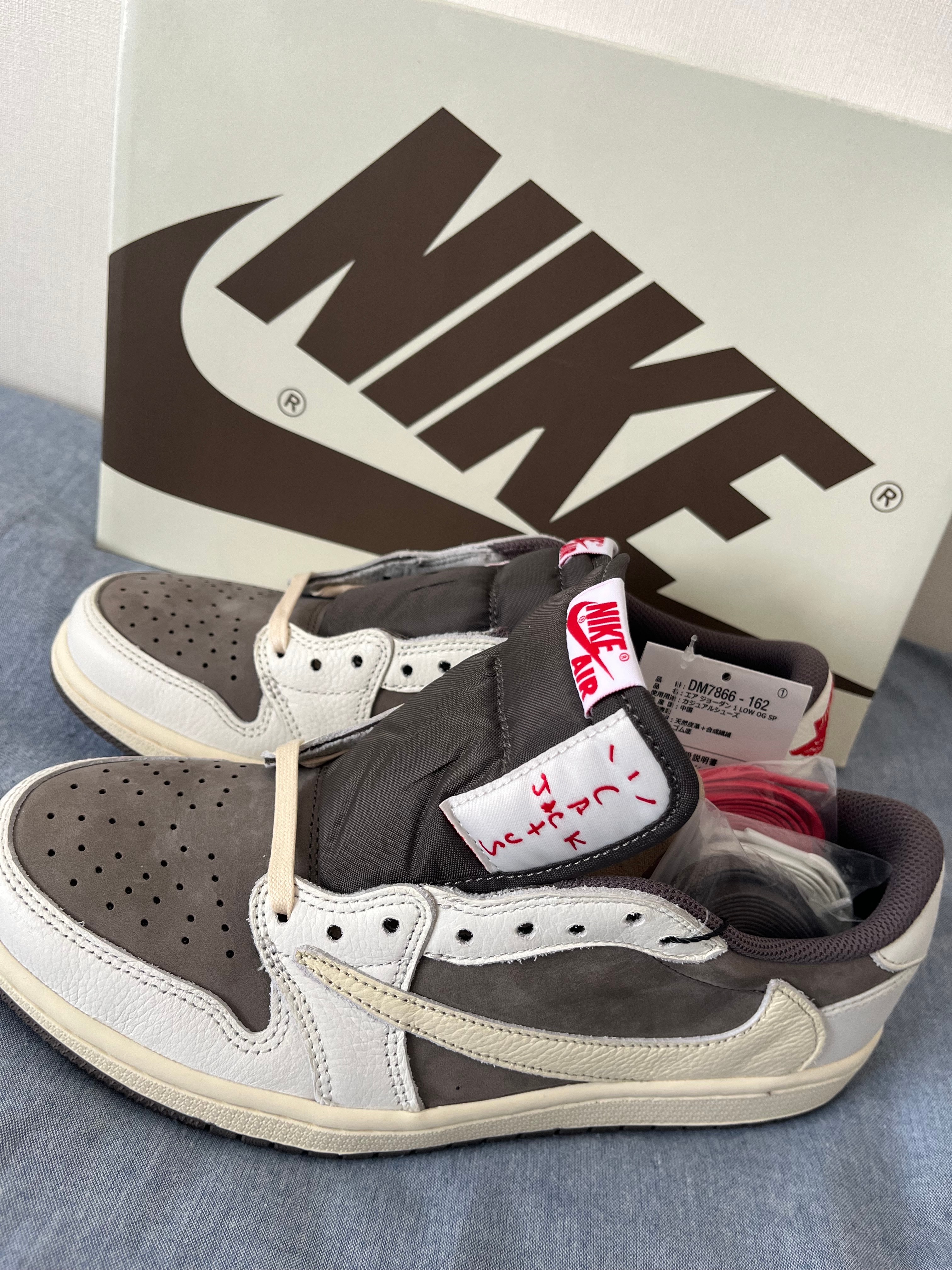 Travis Scott × Nike Air Jordan 1 Low OG SP "Reverse Mocha/Sail and Ridgerock"