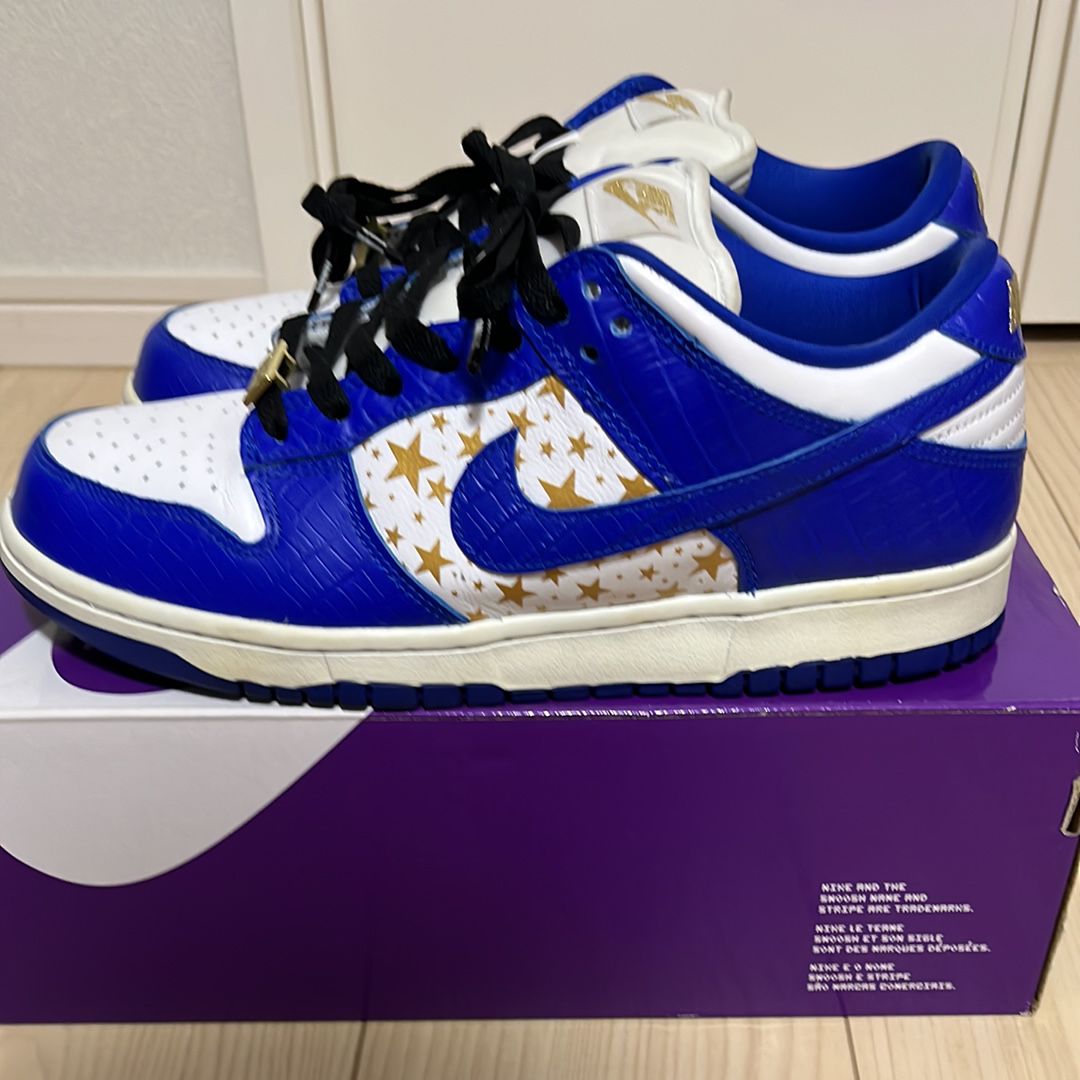 Supreme × Nike SB Dunk Low OG QS Gold Stars "White/Hyper Blue"