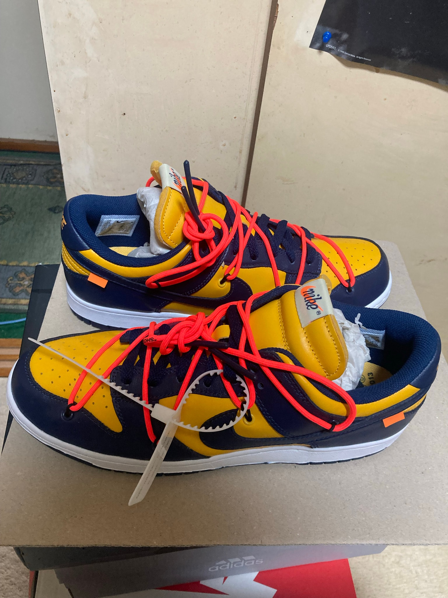 Off-White × Nike Dunk Low LTHR "University Gold/Midnight Navy/White"