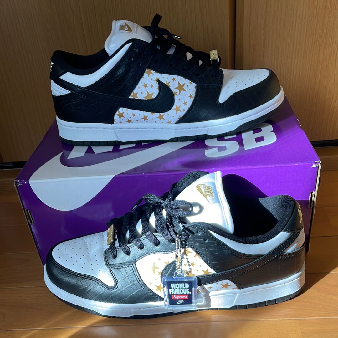 Supreme × Nike SB Dunk Low OG QS Gold Stars "White/Black"