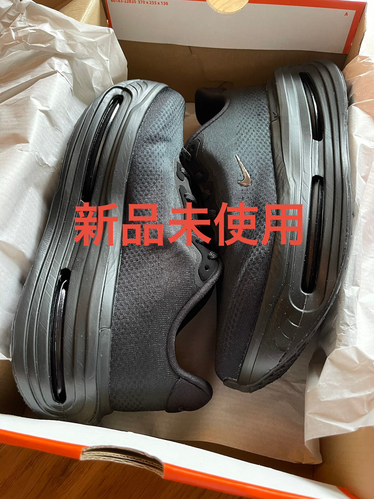 Nike Vomero Premium "Chrome Mini Swoosh/Black"