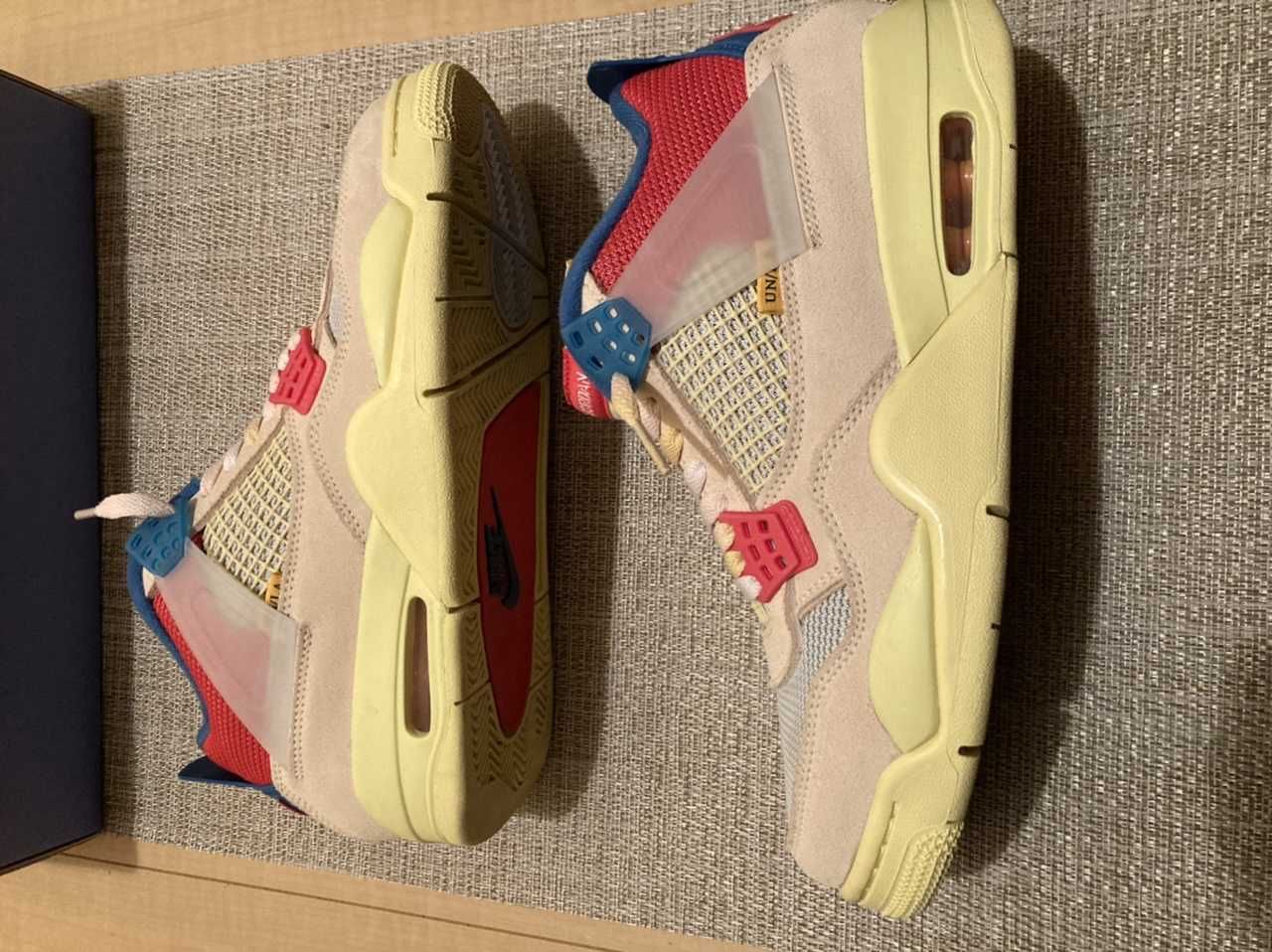 UNION × Nike Air Jordan 4 SP "Guava Ice/Light Fusion Red"