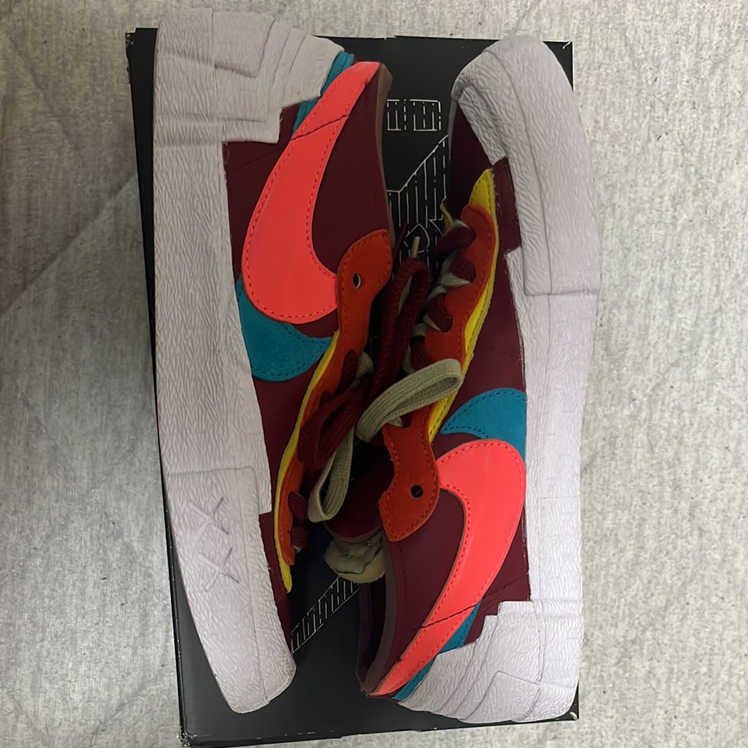 KAWS × sacai × Nike Blazer Low "Team Red"