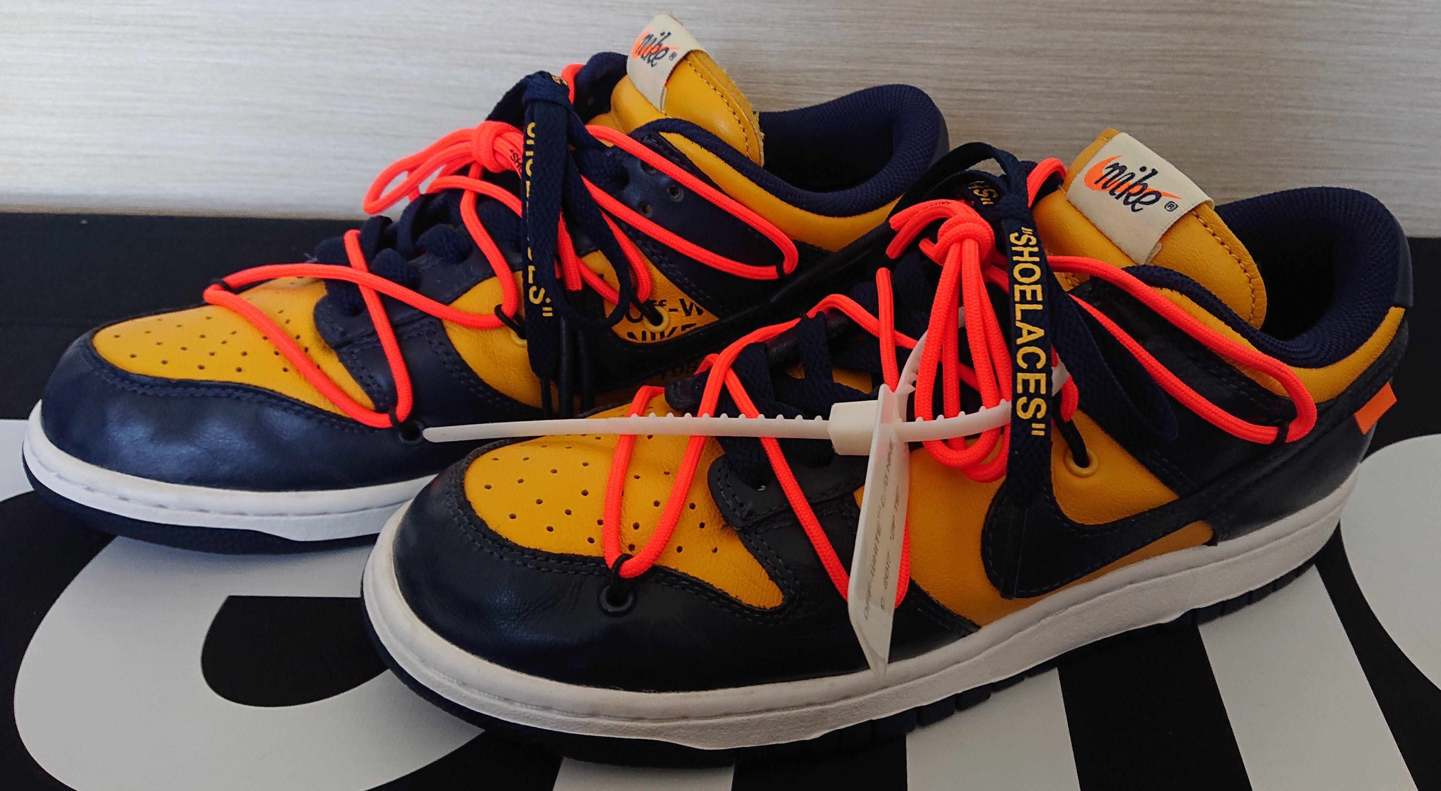 Off-White × Nike Dunk Low LTHR "University Gold/Midnight Navy/White"
