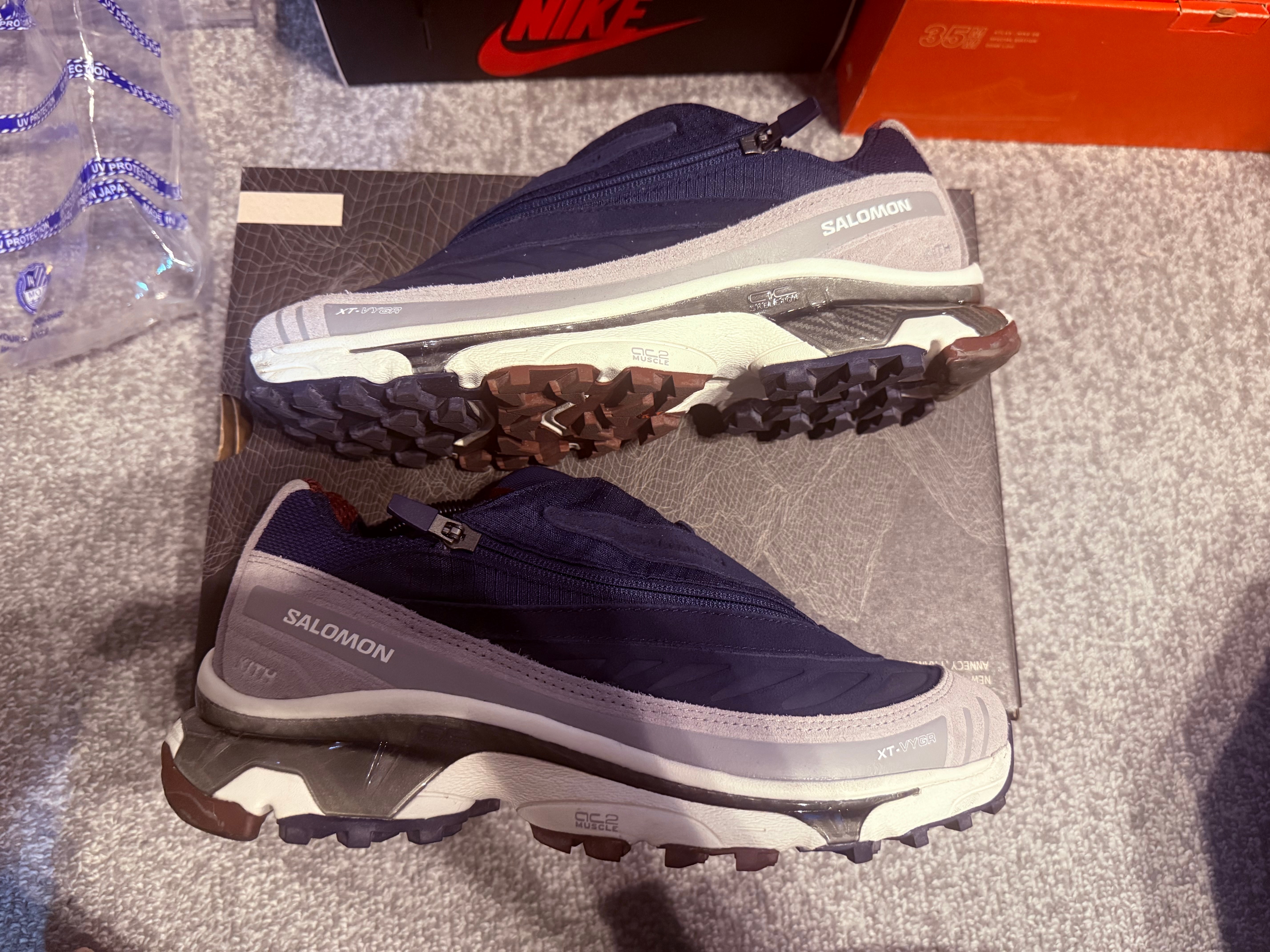 KITH × Salomon XT-Voyager "Maritime Blue/Alloy/Tawny Port"