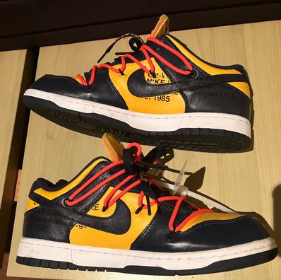 Off-White × Nike Dunk Low LTHR "University Gold/Midnight Navy/White"