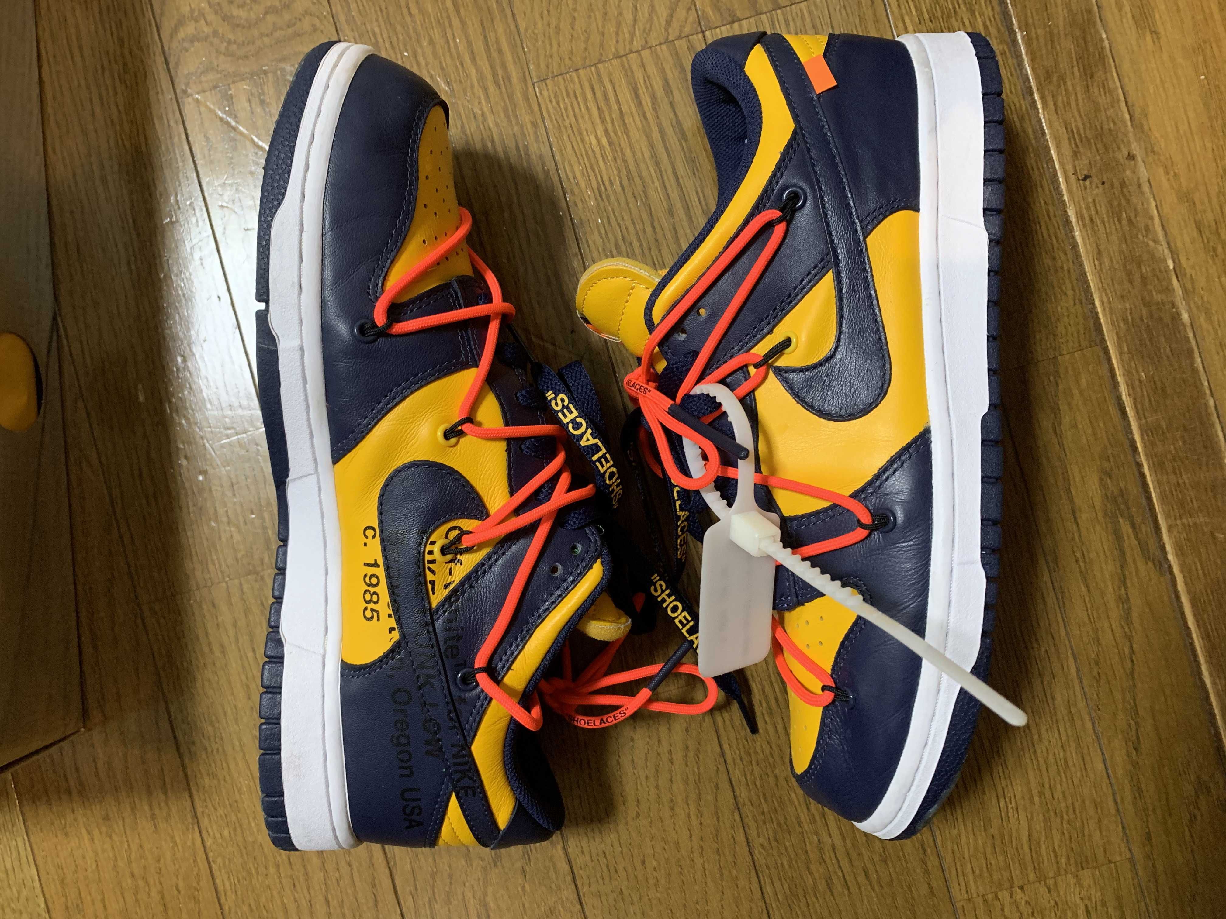 Off-White × Nike Dunk Low LTHR "University Gold/Midnight Navy/White"