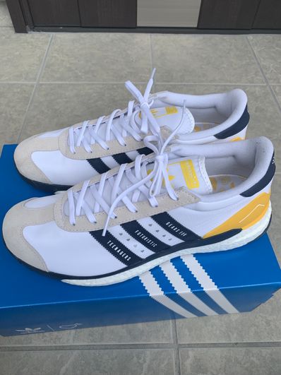 HUMAN MADE × adidas CONSORTIUM COUNTRY "HAZY YELLOW/COLLEGE NAVY"