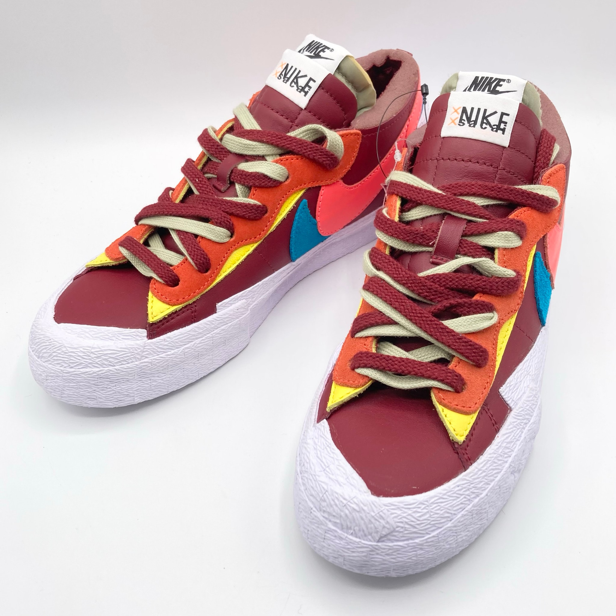 KAWS × sacai × Nike Blazer Low "Team Red"