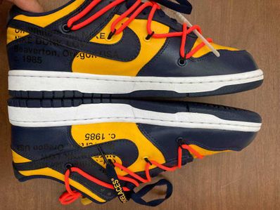 Off-White × Nike Dunk Low LTHR "University Gold/Midnight Navy/White"