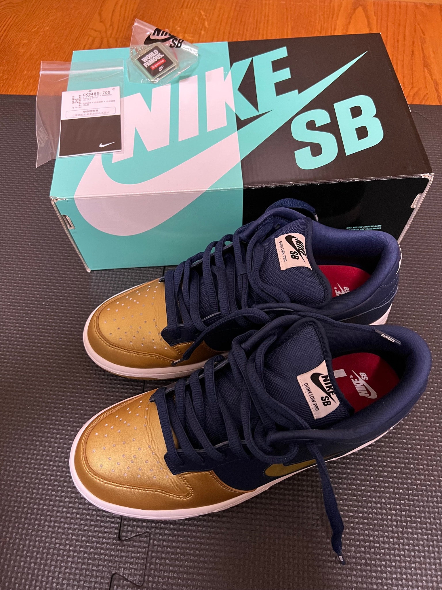 Supreme × Nike SB Dunk Low OG QS "Metallic Gold/Navy"