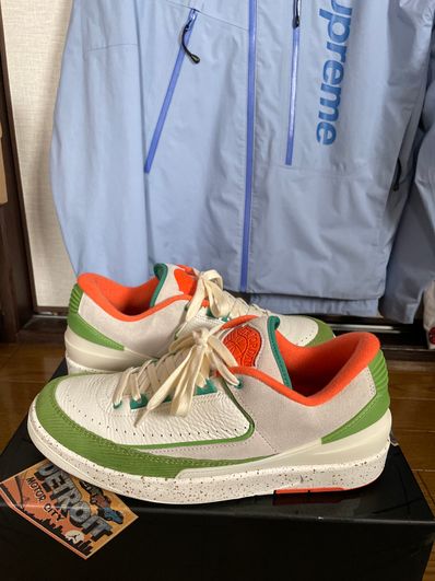 The Titan × Nike Women's Air Jordan 2 Low "Safety Orange/Chlorophyll"