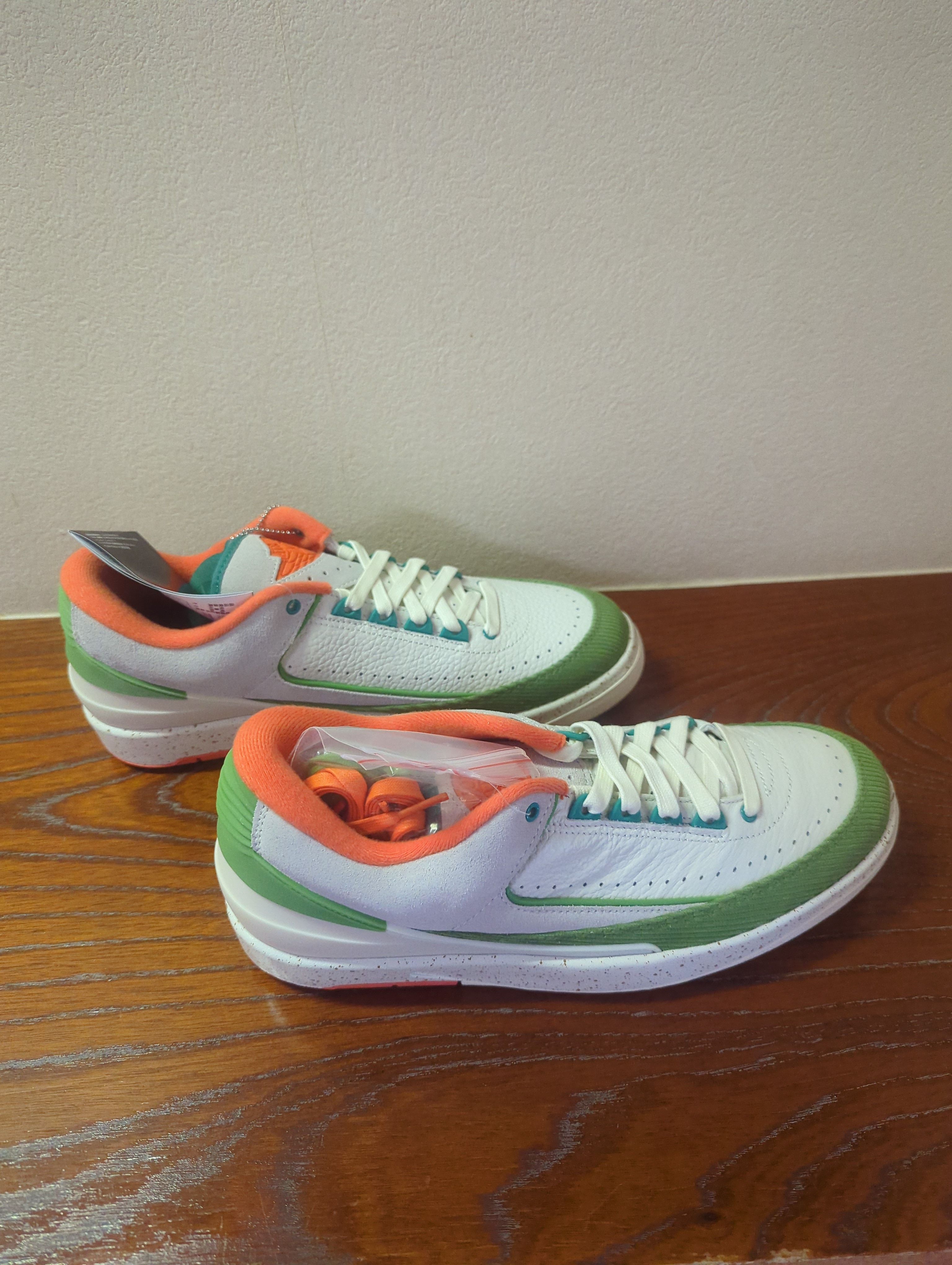 The Titan × Nike Women's Air Jordan 2 Low "Safety Orange/Chlorophyll"