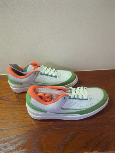 The Titan × Nike Women's Air Jordan 2 Low "Safety Orange/Chlorophyll"