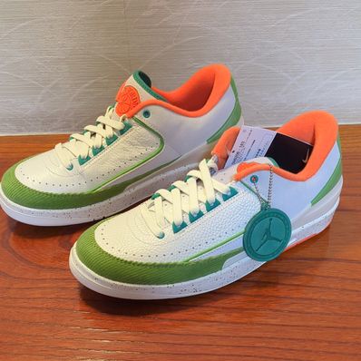 The Titan × Nike Women's Air Jordan 2 Low "Safety Orange/Chlorophyll"