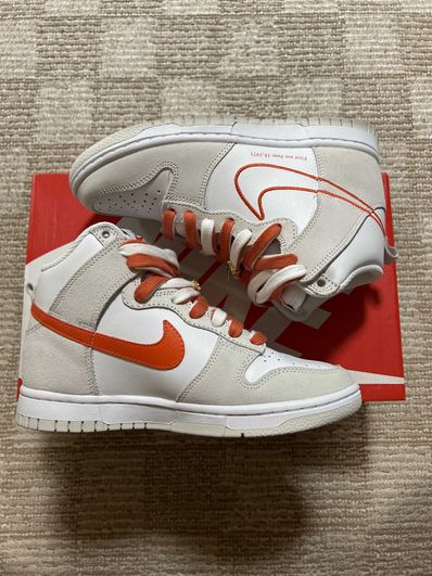 NIKE Women's DUNK HIGH SE FIRST USE "WHITE/ORANGE"