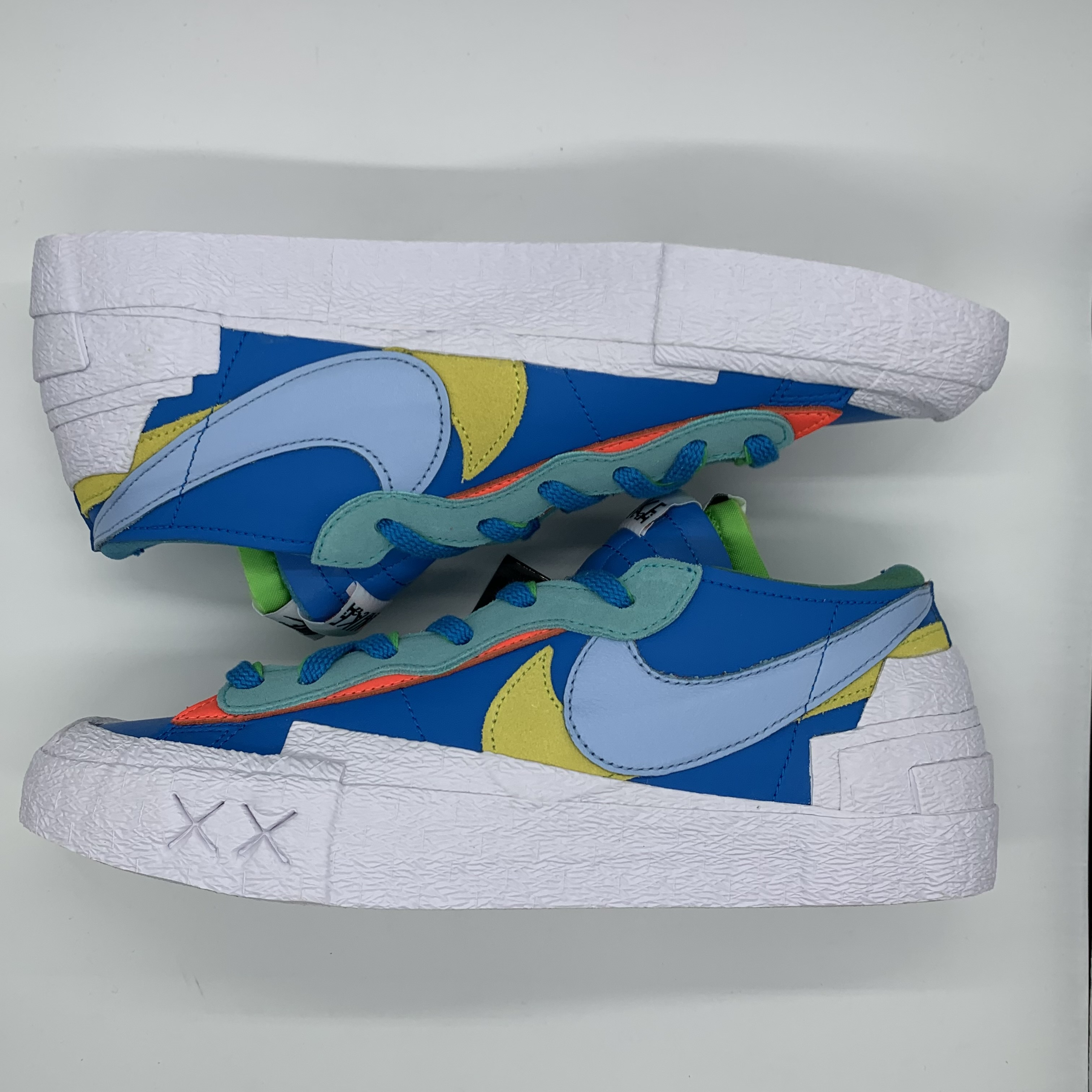 KAWS × sacai × Nike Blazer Low "Neptune Blue"